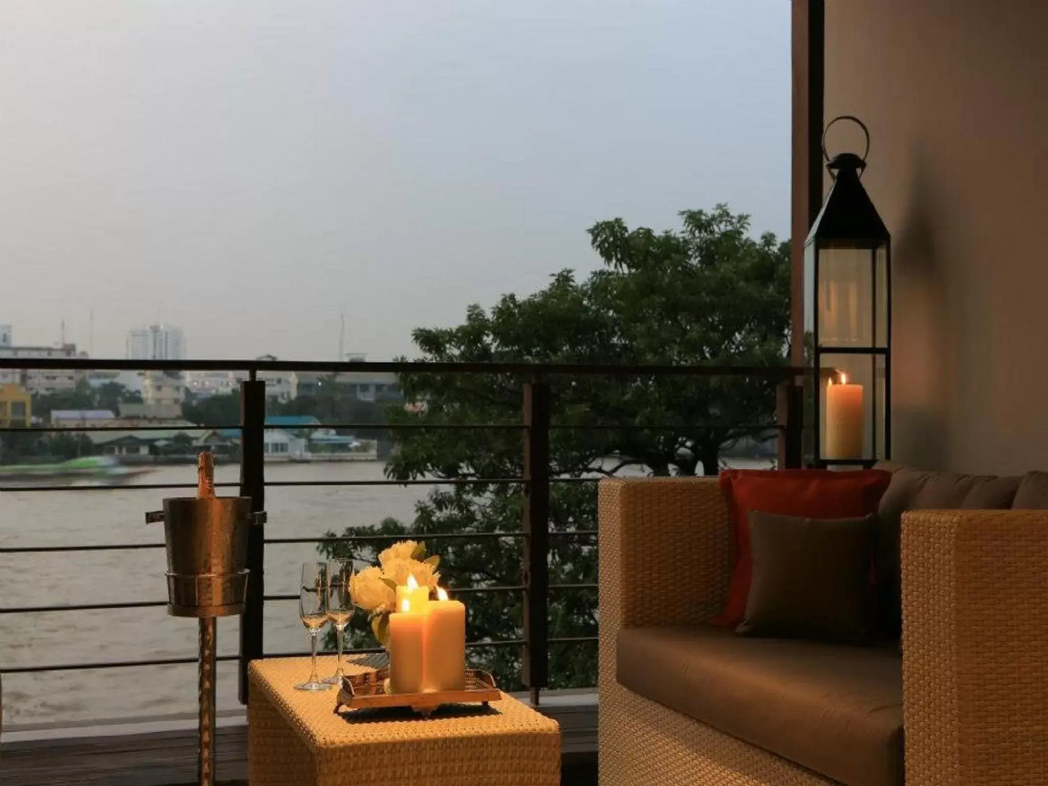 Premium Riva Room with River View and Balcony in Riva Surya Bangkok Premium Riva Room with River View and Balcony in Riva Surya Bangkok