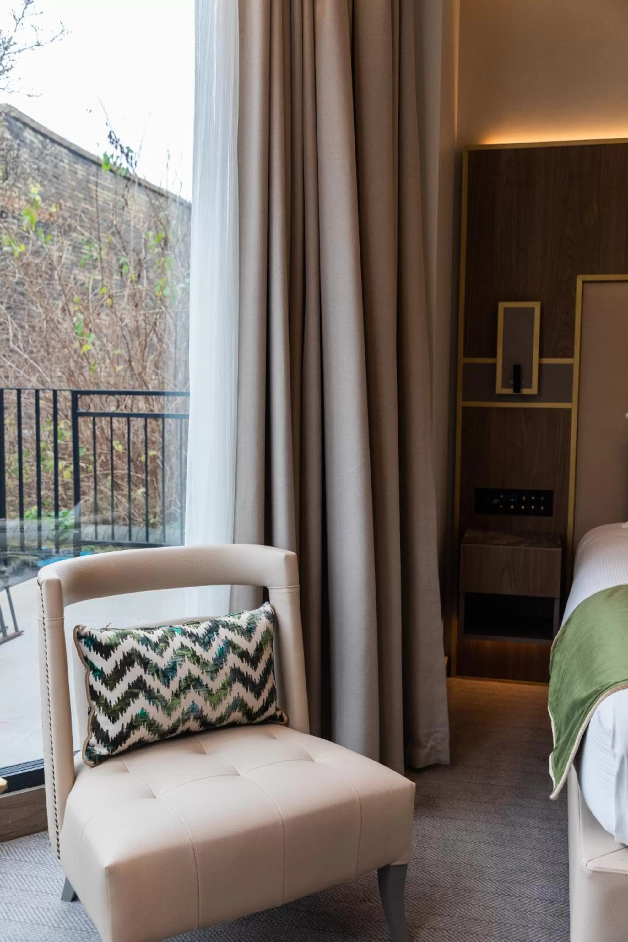 Bed in Merit Kensington Hotel