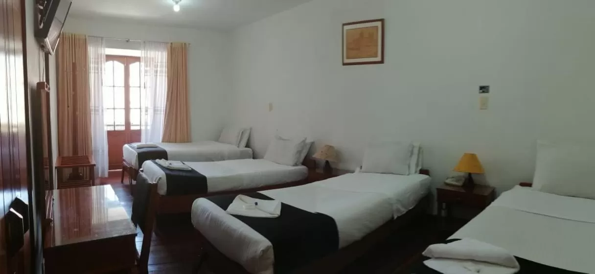 Quadruple Room with Balcony in Hotel El Cid Plaza Premium