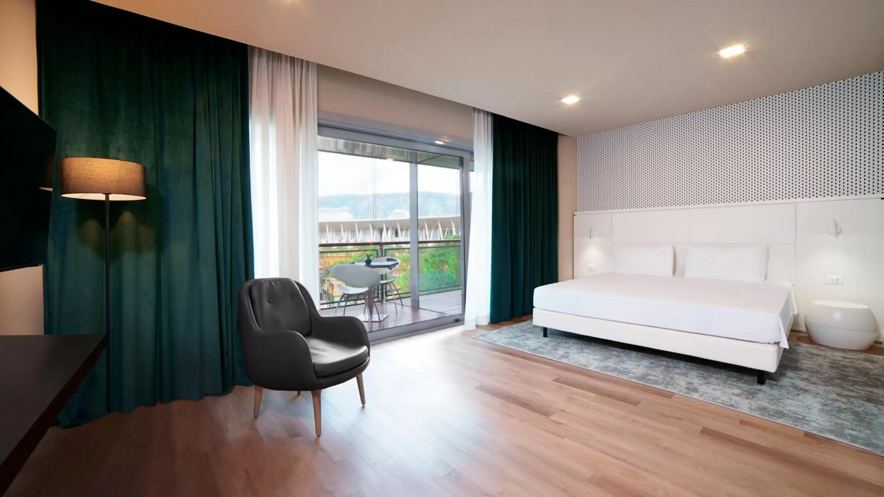 Photo of the whole room, Bed in voco Nola - Naples Vulcano Buono by IHG