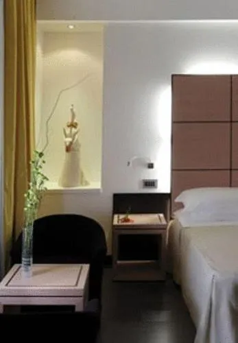 Bed in Hotel Cimarosa