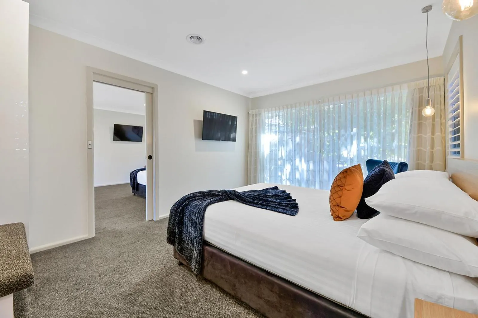 Bed in Central Caleula Motor Lodge