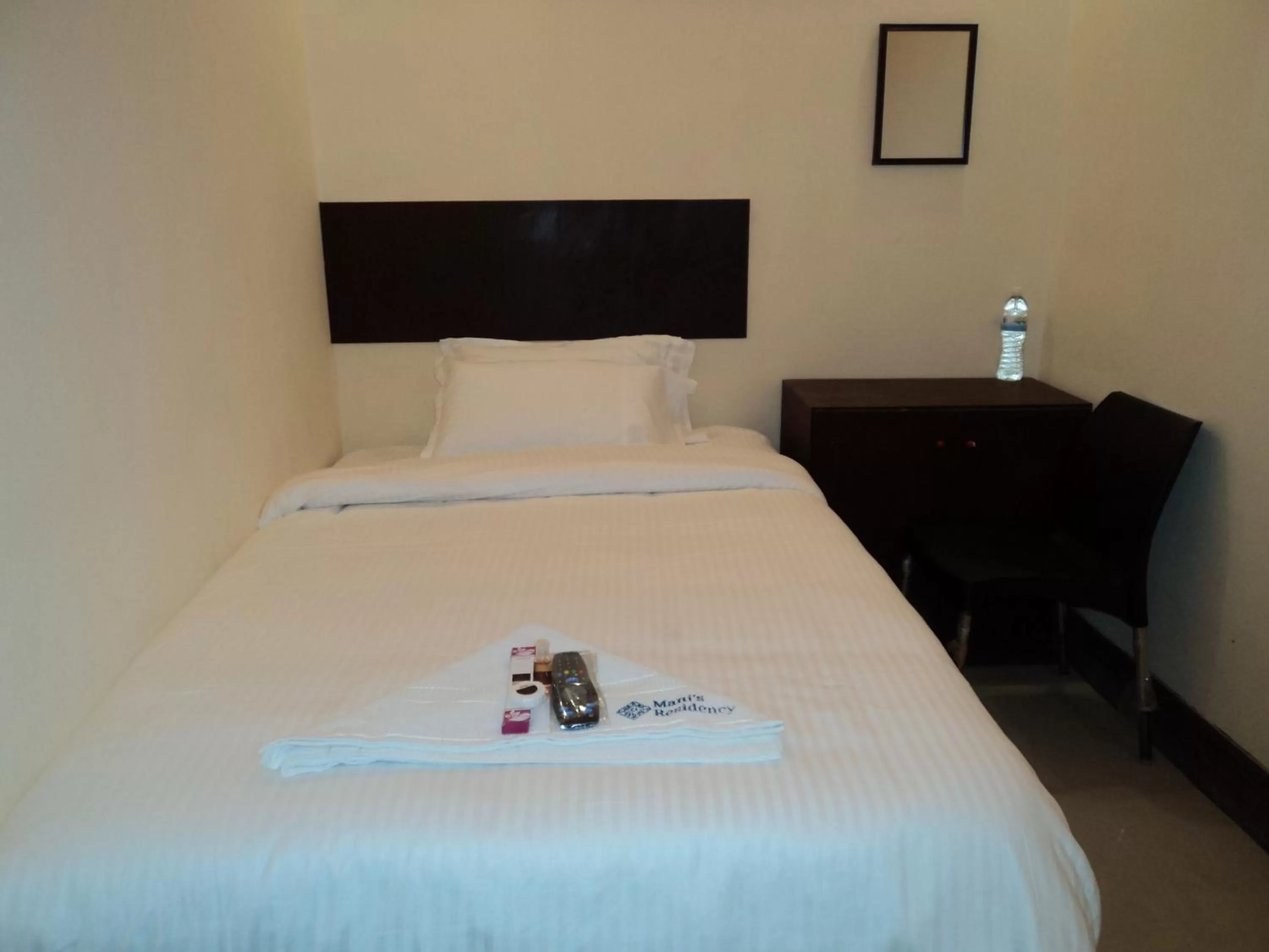 Bed in Mani's residency