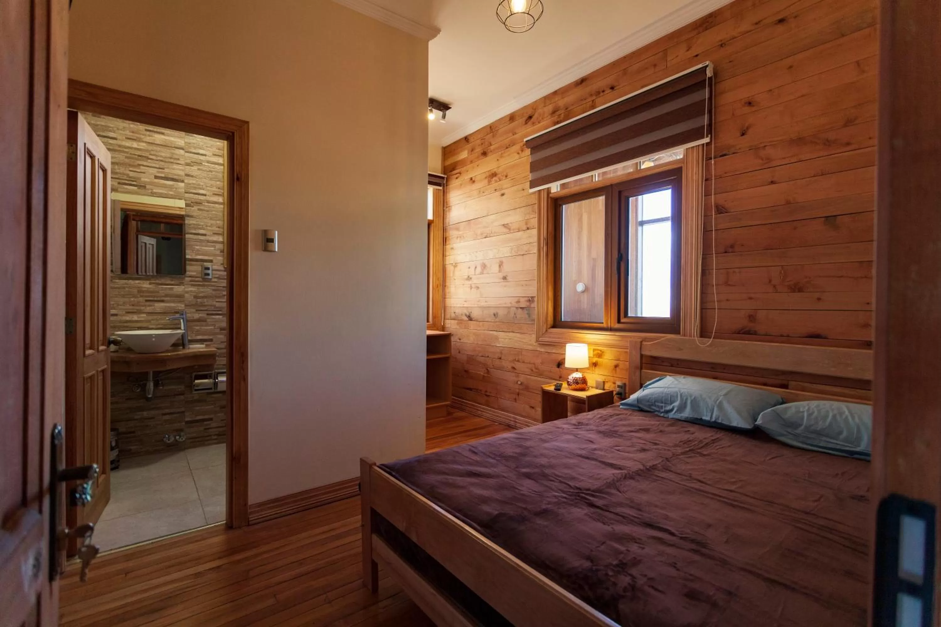 Photo of the whole room, Bed in Hostal Boutique Patagonia Mística