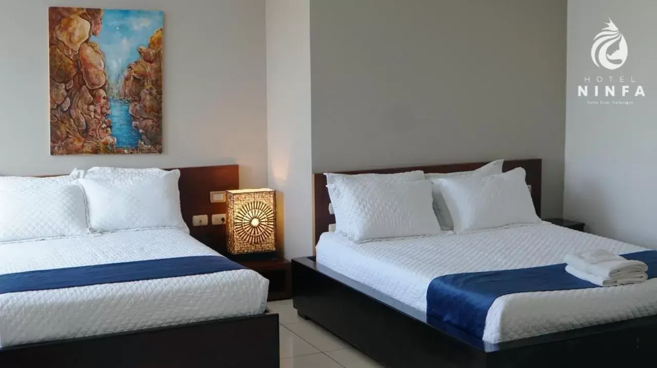 Deluxe Double Room with Two Double Beds - single occupancy in Hotel Las Ninfas Deluxe Double Room with Two Double Beds - single occupancy in Hotel Las Ninfas