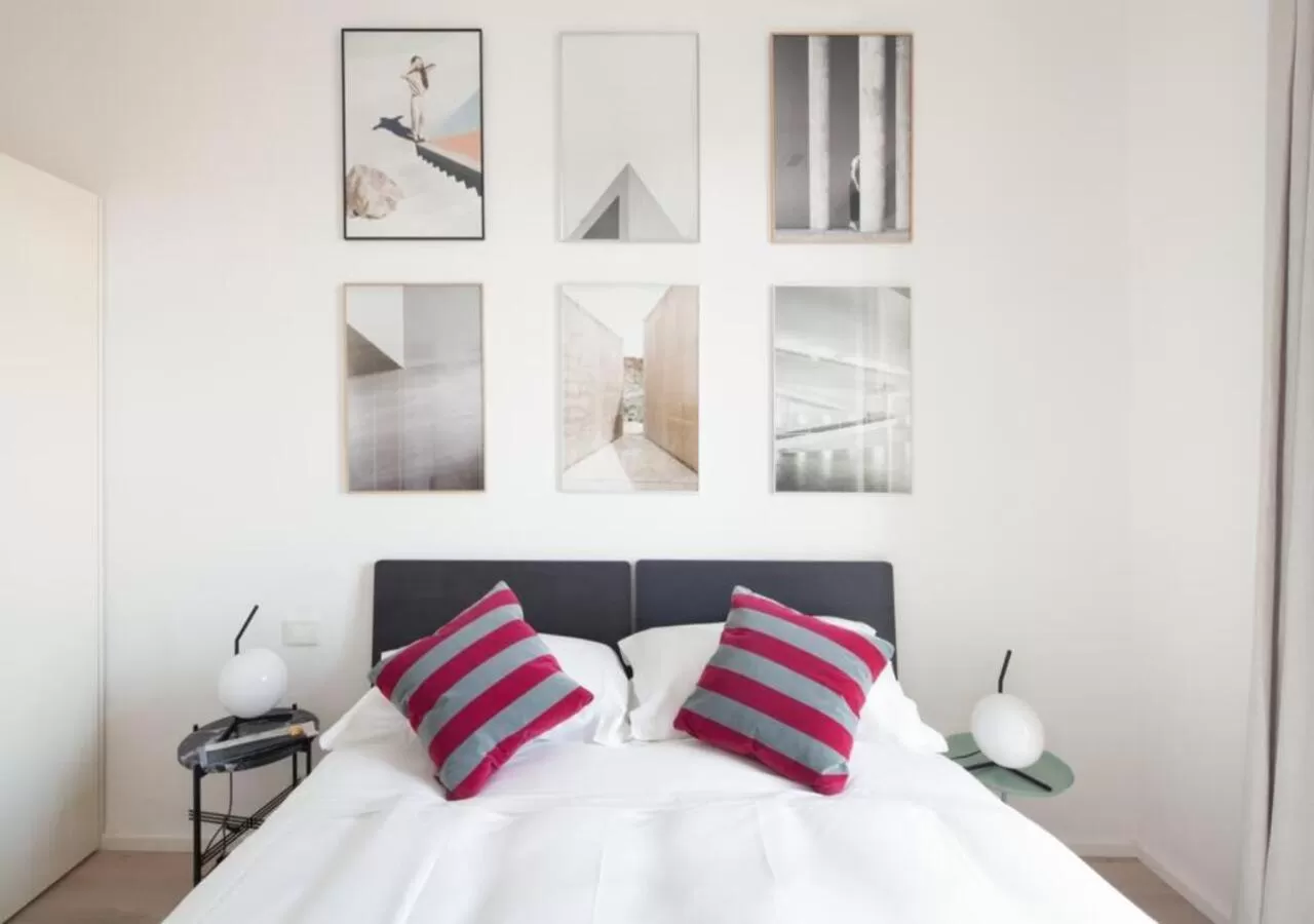 Bed in BB Hotels Aparthotel Collection Il Michelangelo