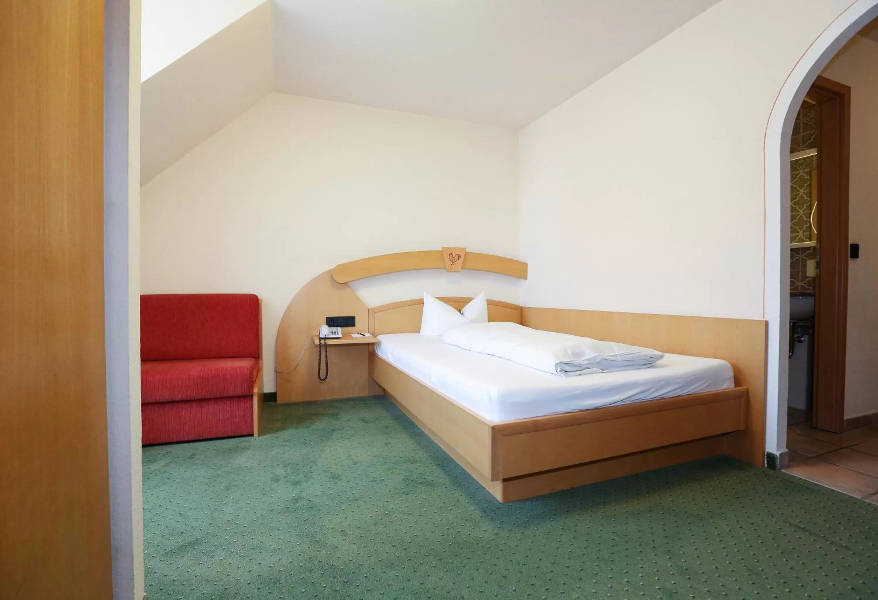 Bed in Arthotel ANA Goggl