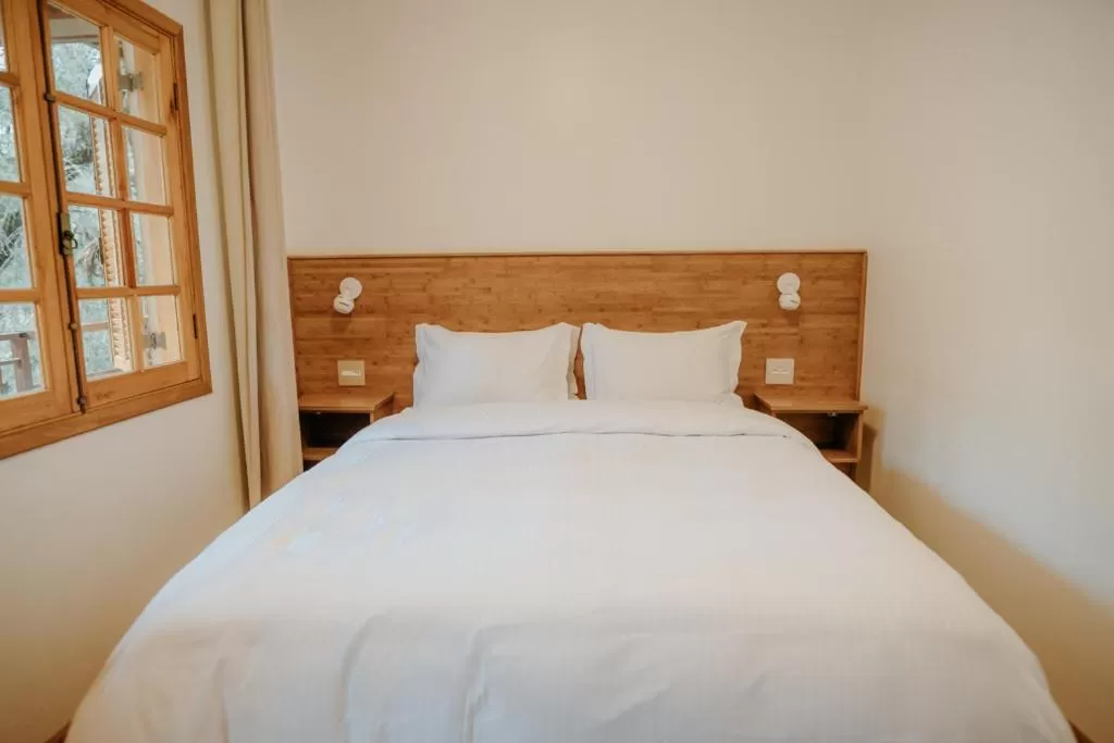 Bed in La Brume Pousada