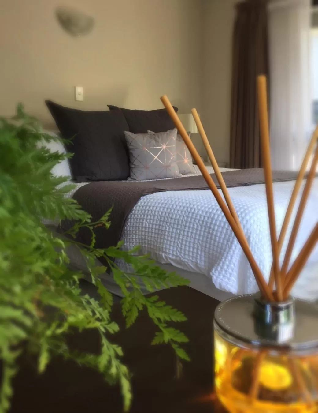 Bed in Blenheim Palms Motel