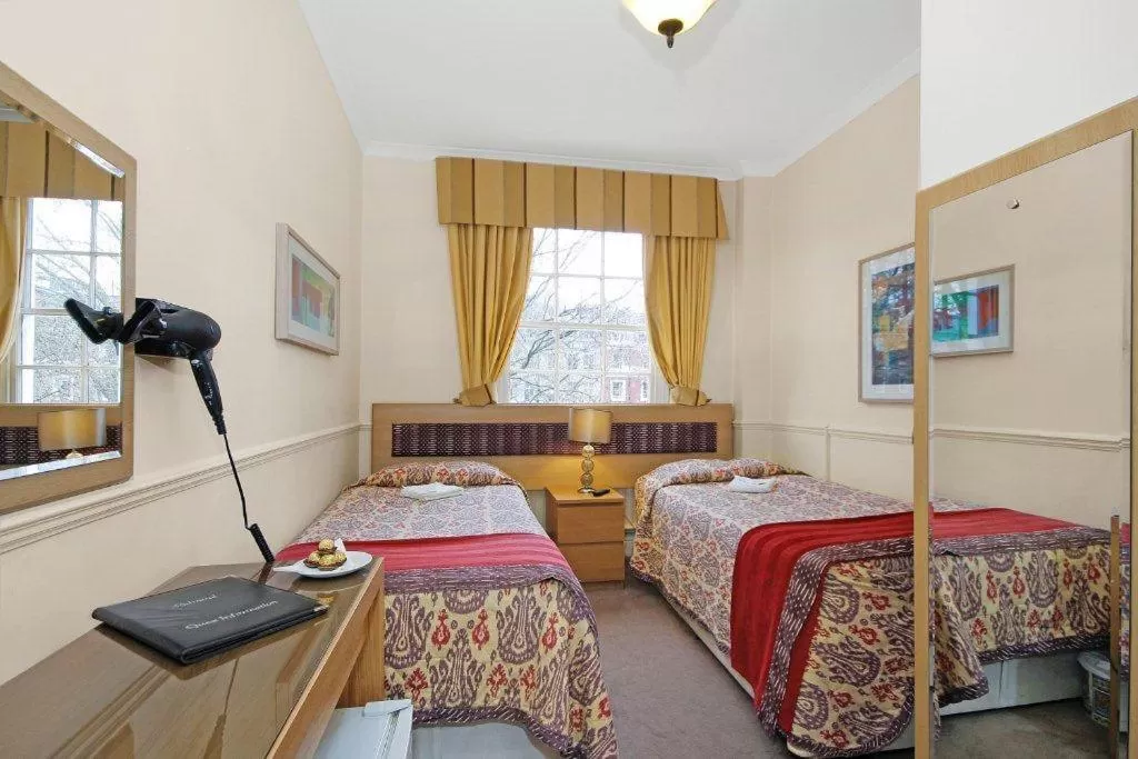 Bed in Admiral Hotel at Park Avenue