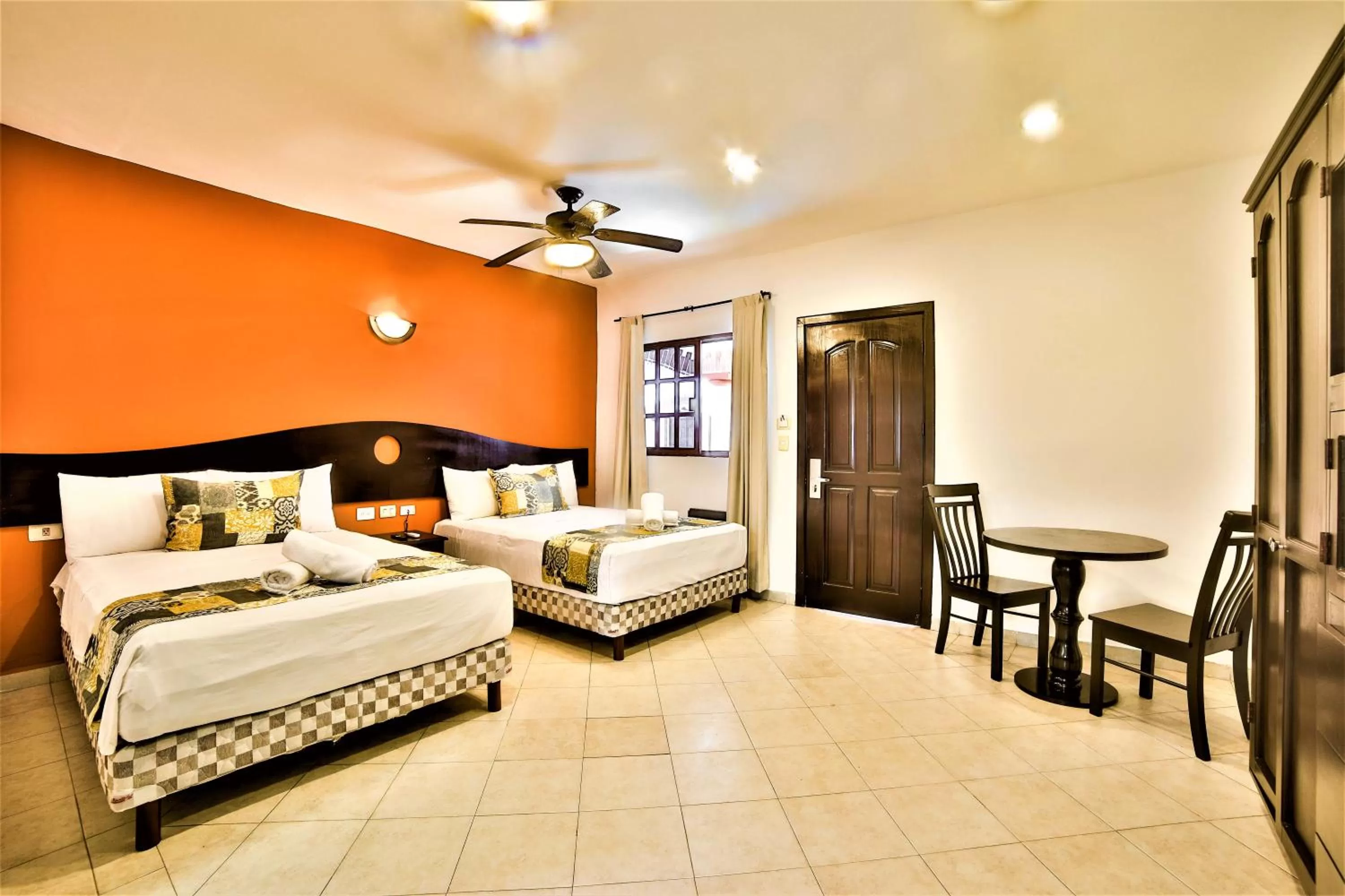 Photo of the whole room, Bed in Hotel Colonial Playa del Carmen