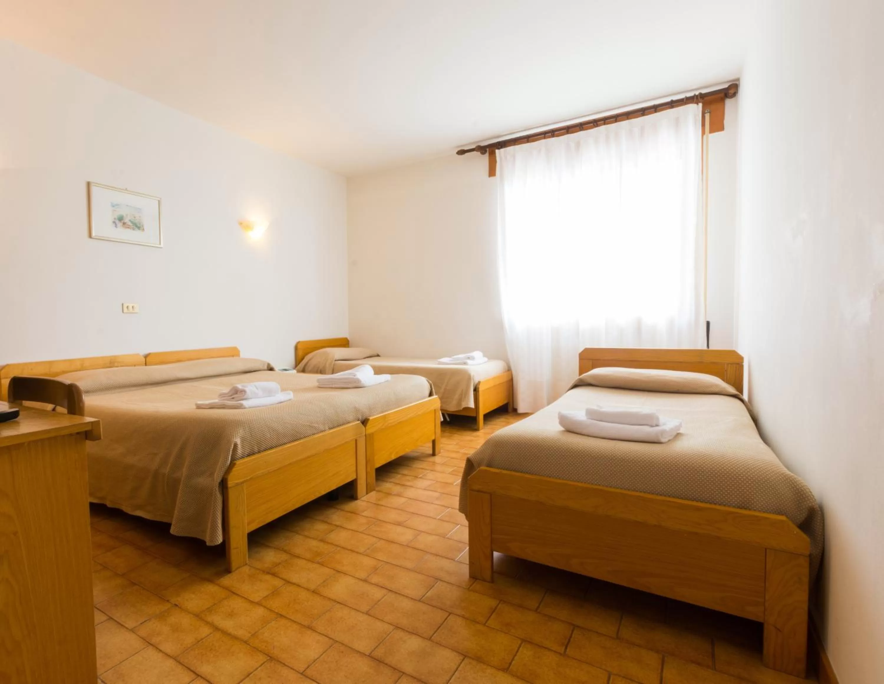Bed in Albergo Dalla Mena