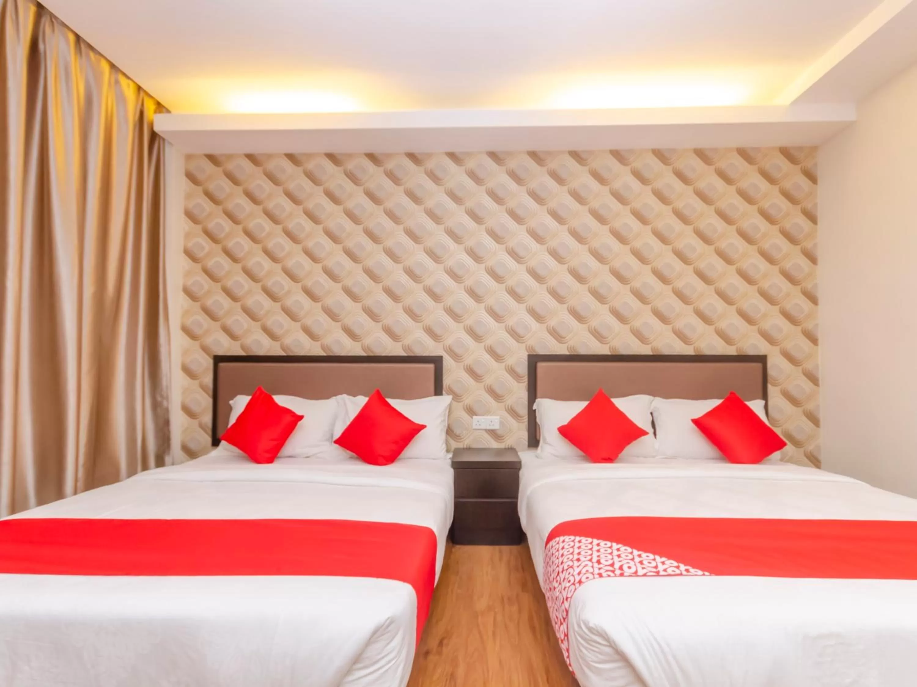 Bedroom in OYO 1214 Oro Hotel