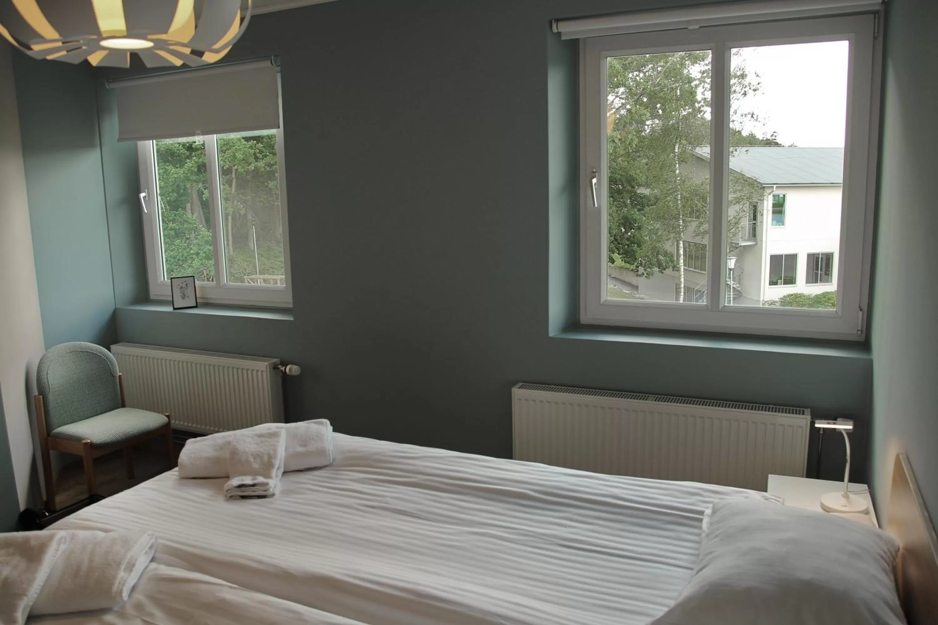 Garden view, Bed in Hotell Munkeröd