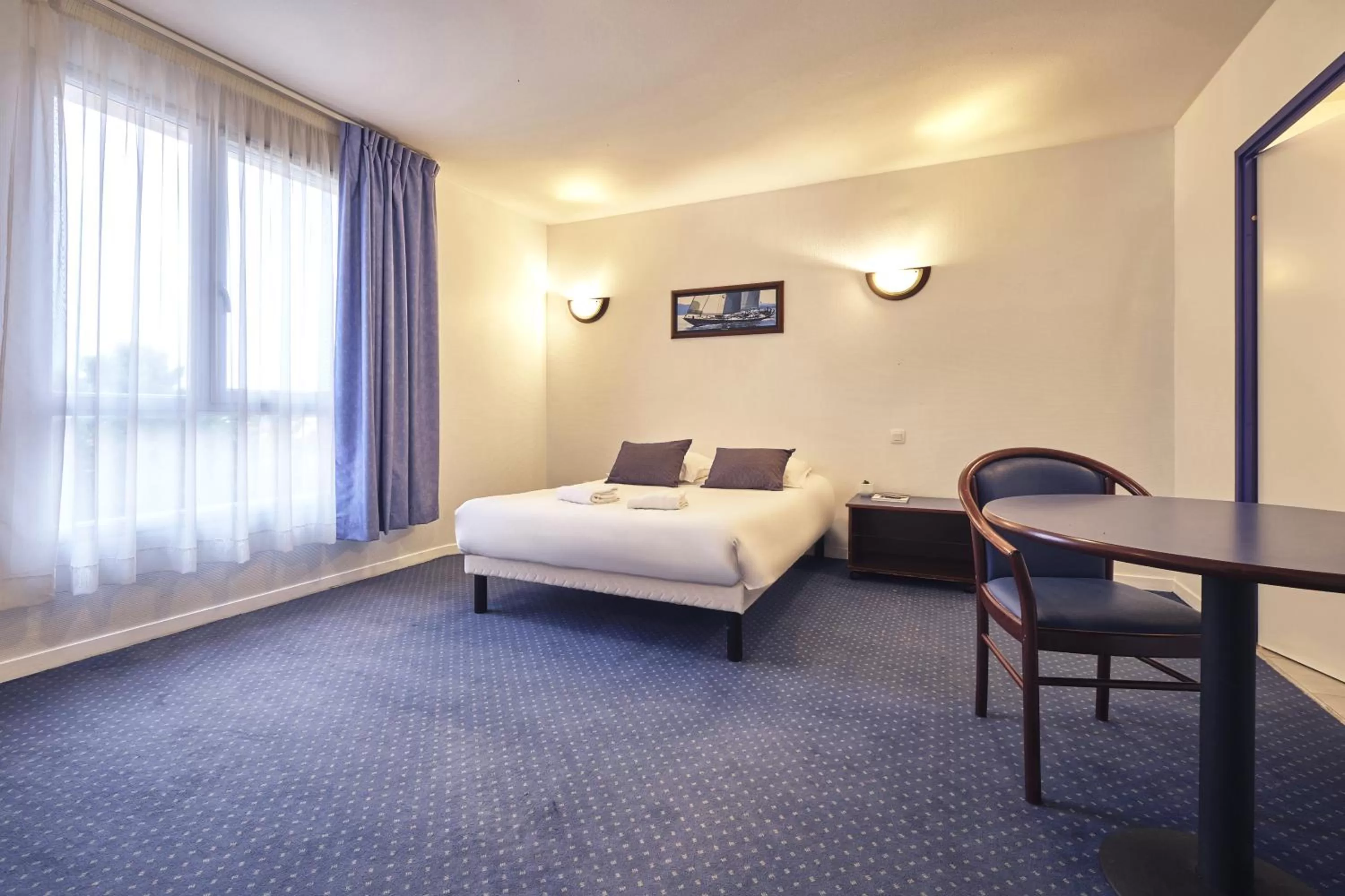 Bed in Comfort Aparthotel Carcassonne