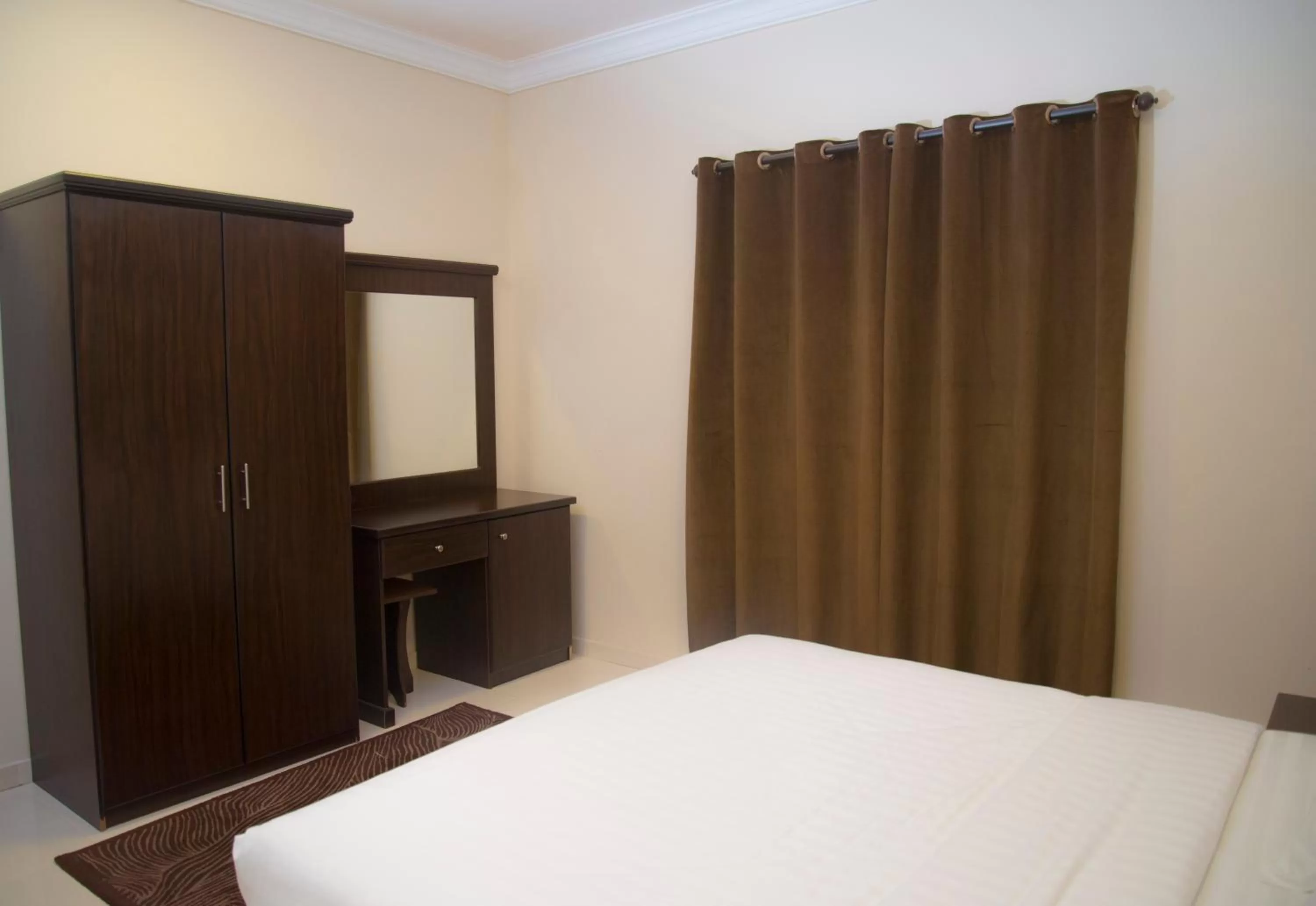 Bedroom, Bed in Shams Suites Furnished Units