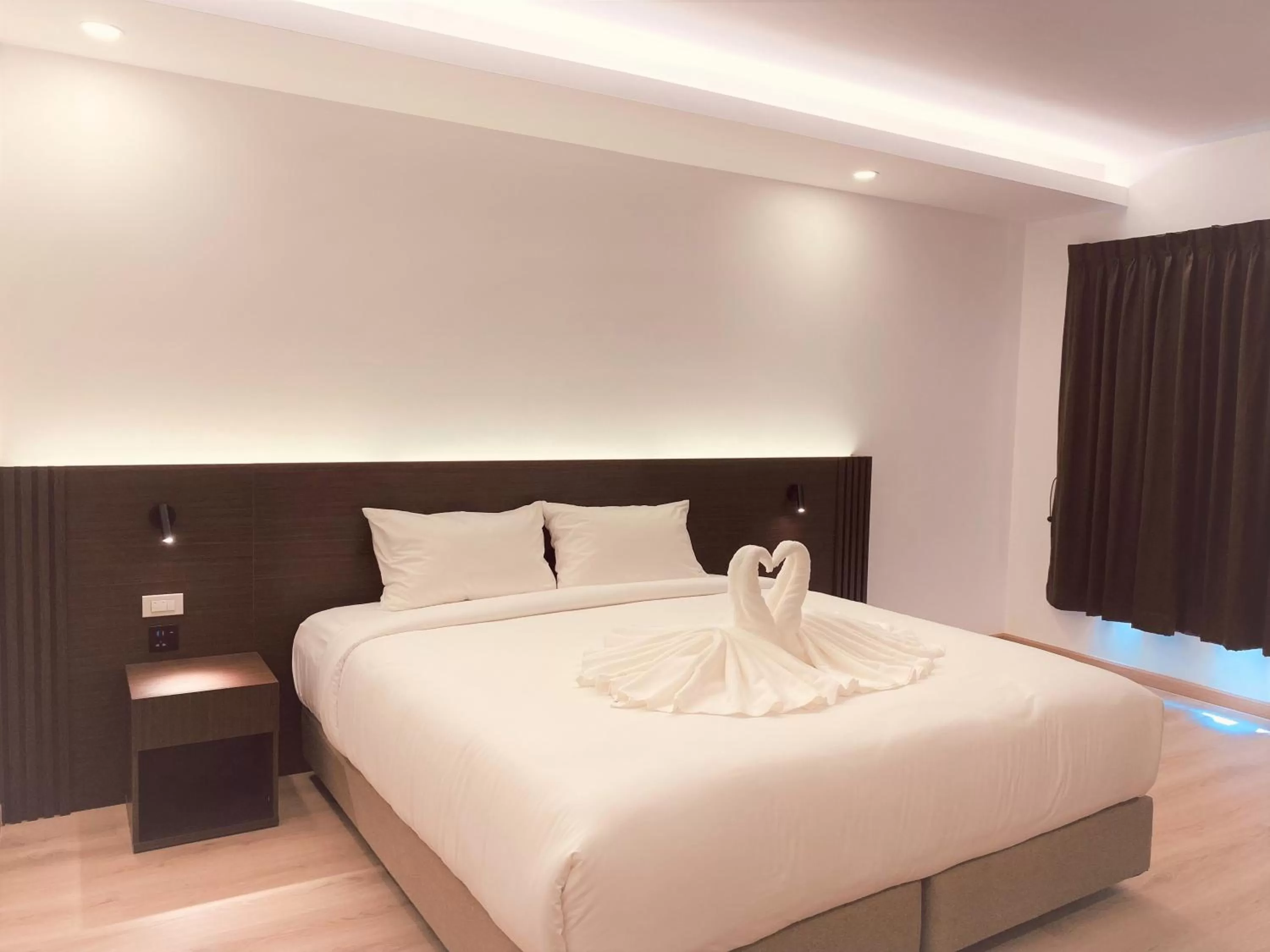 Bed in GEEN Hotel Chonburi