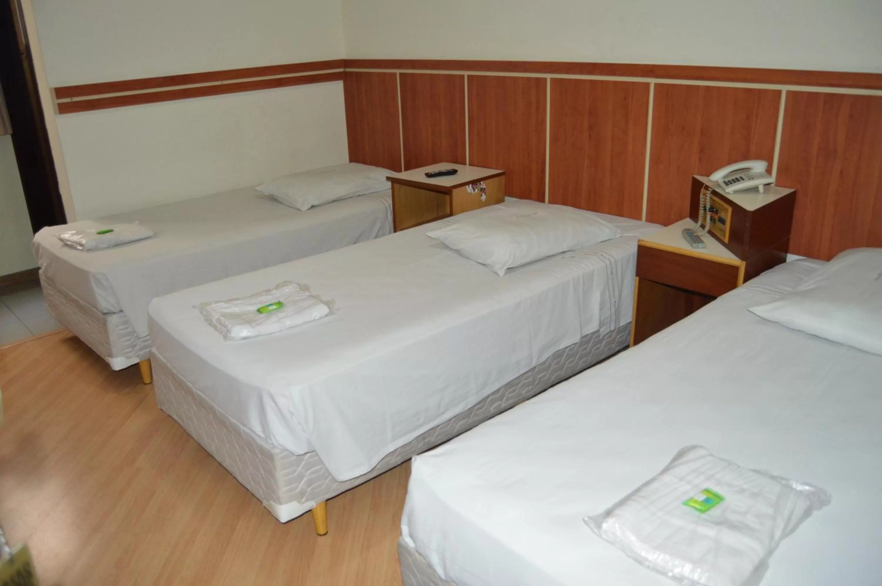 Bed in Aero Plaza Hotel