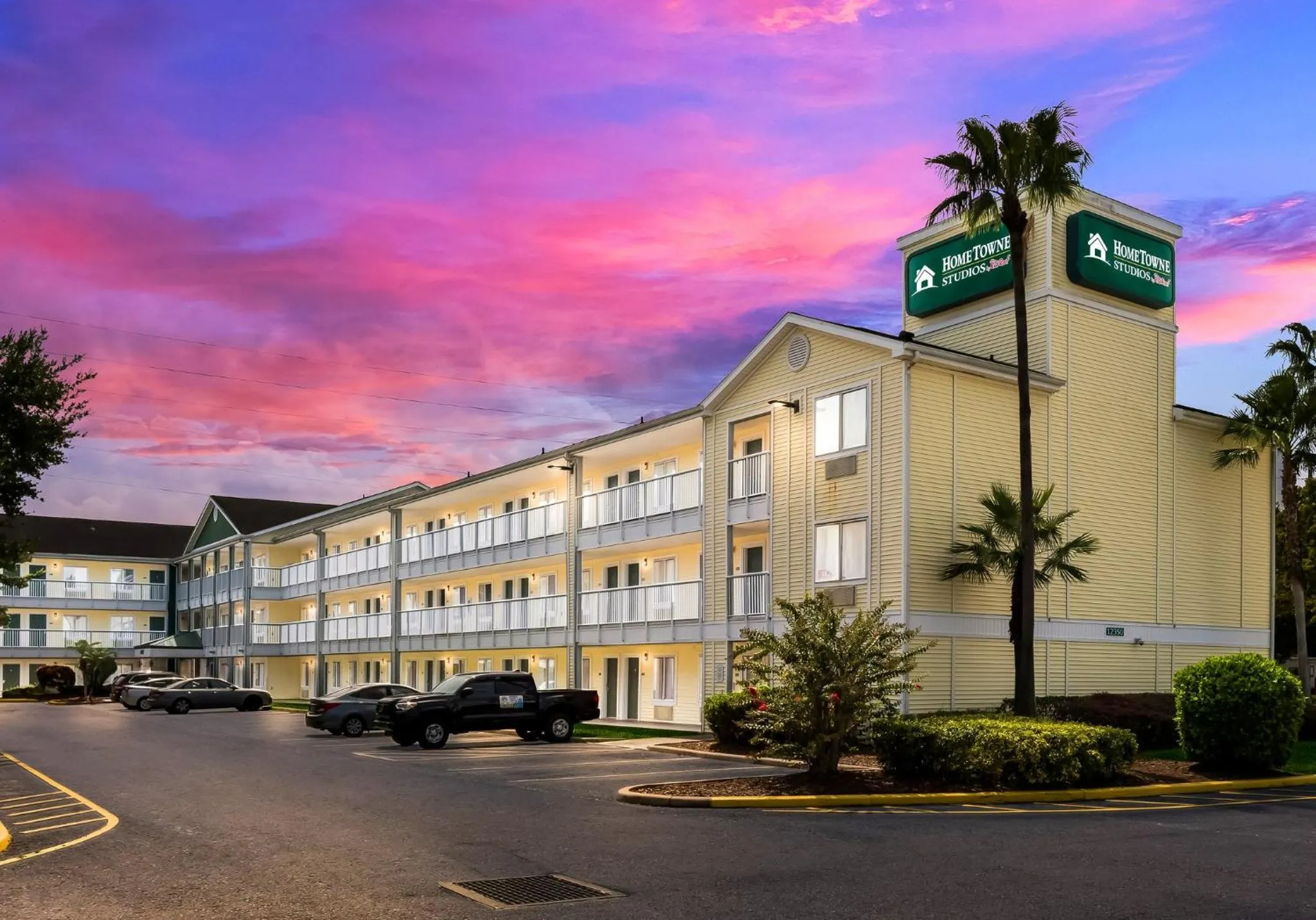 Property building in HomeTowne Studios by Red Roof Orlando - UCF Area