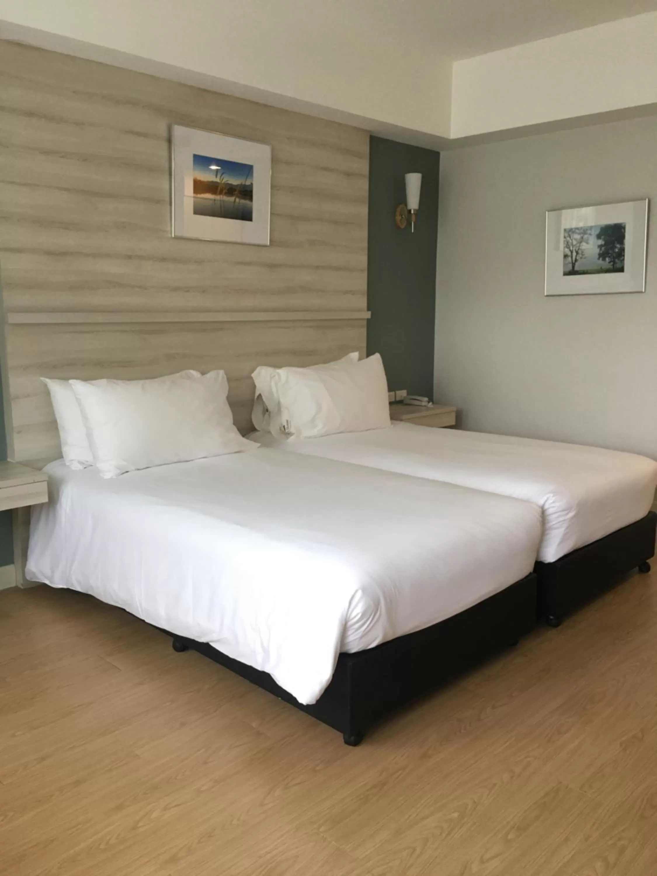 Bed in The Farm House Hotel Ranong