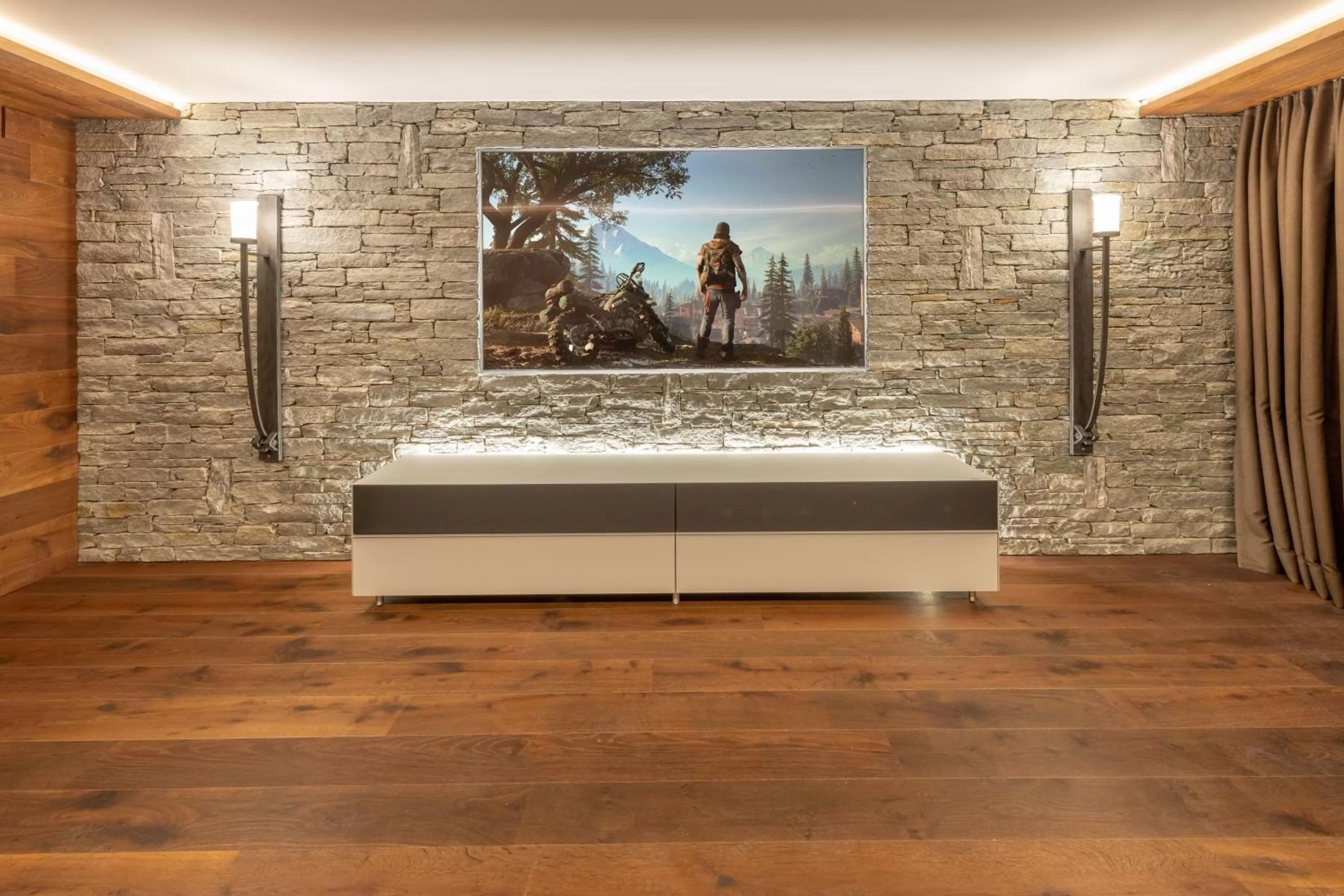 Communal lounge/ TV room in Hotel Heimatlodge