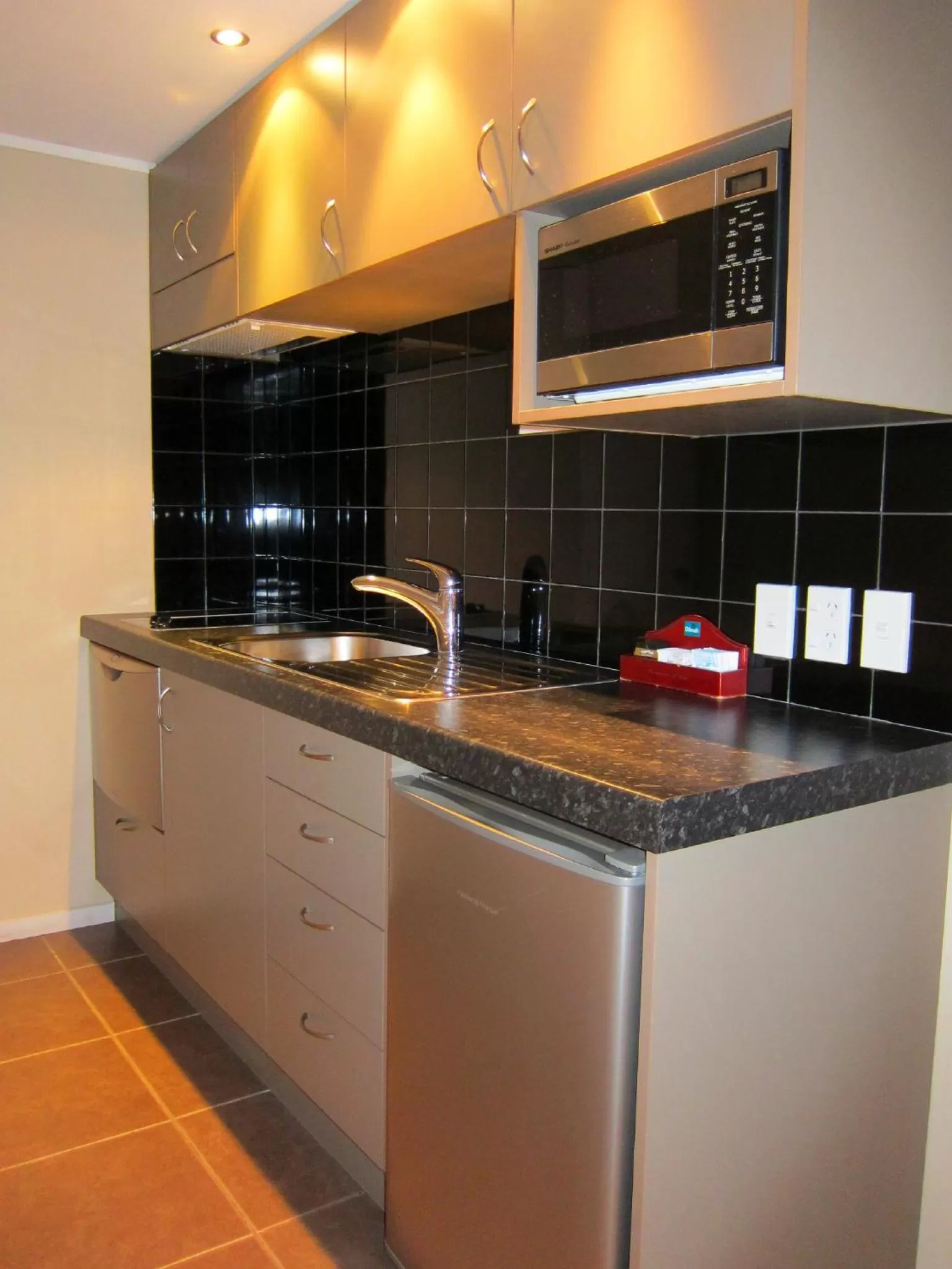 Kitchen or kitchenette in St James Apartments