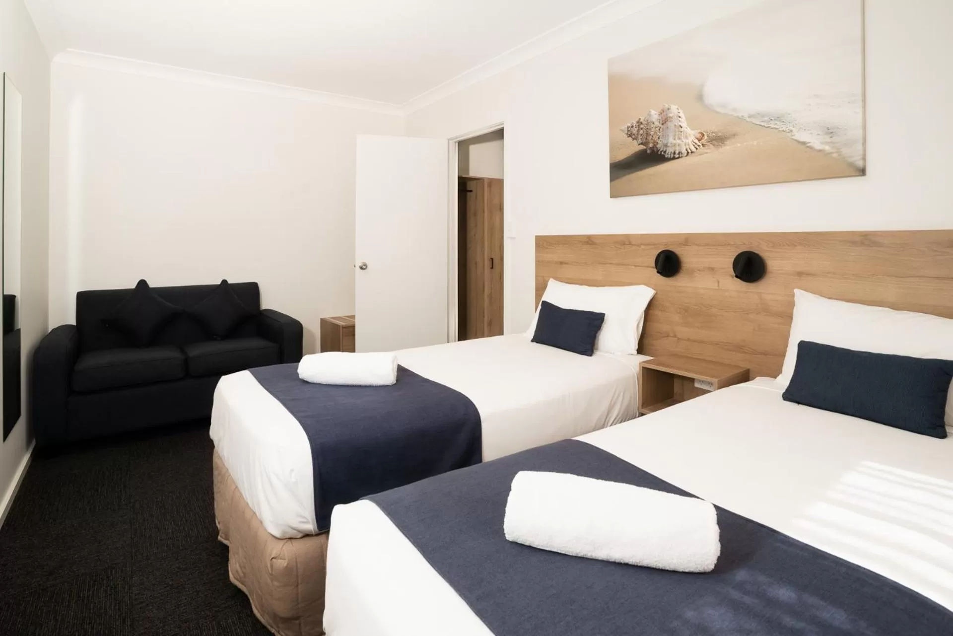 Bed in Caribbean Motel