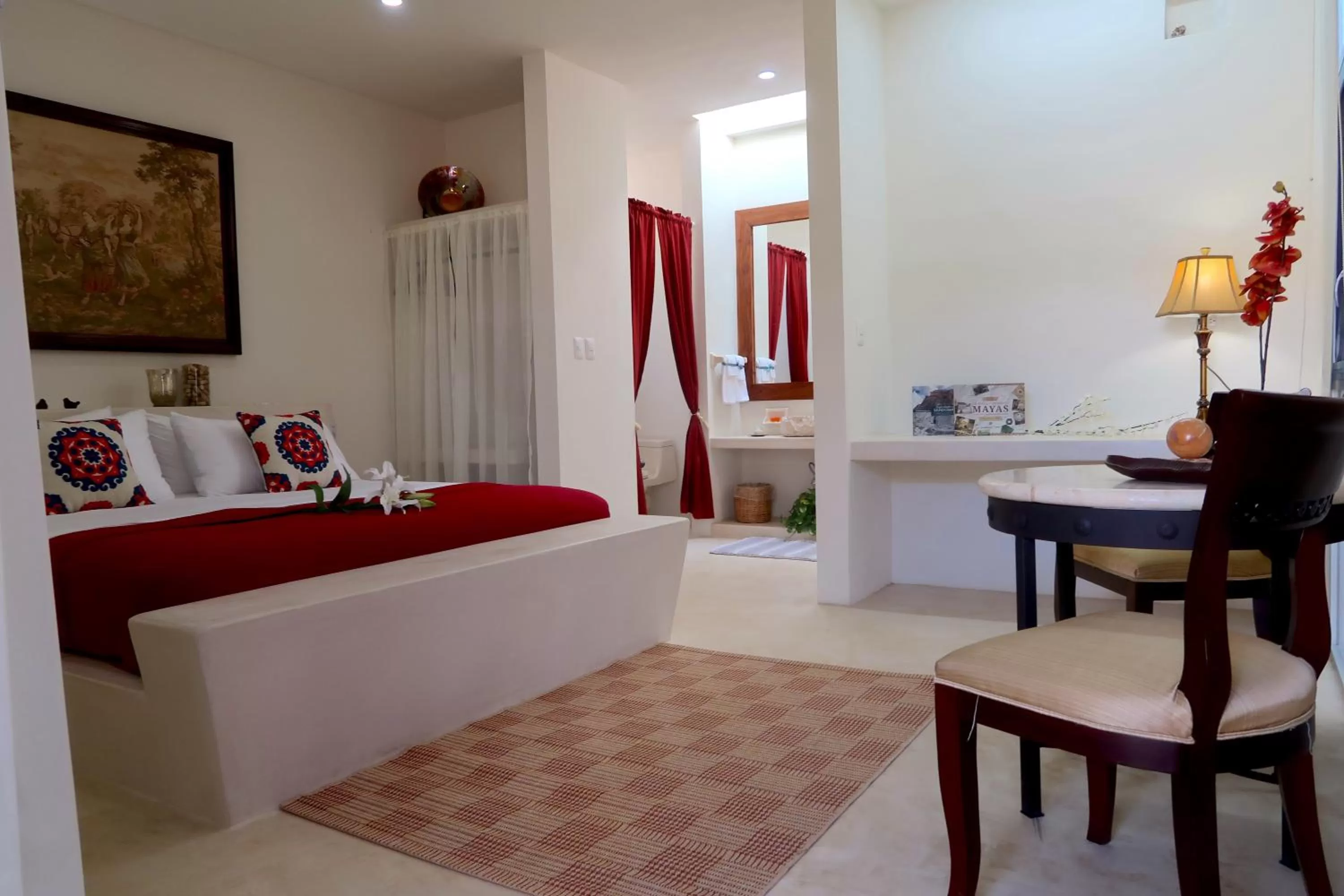 Living room, Bed in Hotel Casa de Campo Conkal Merida