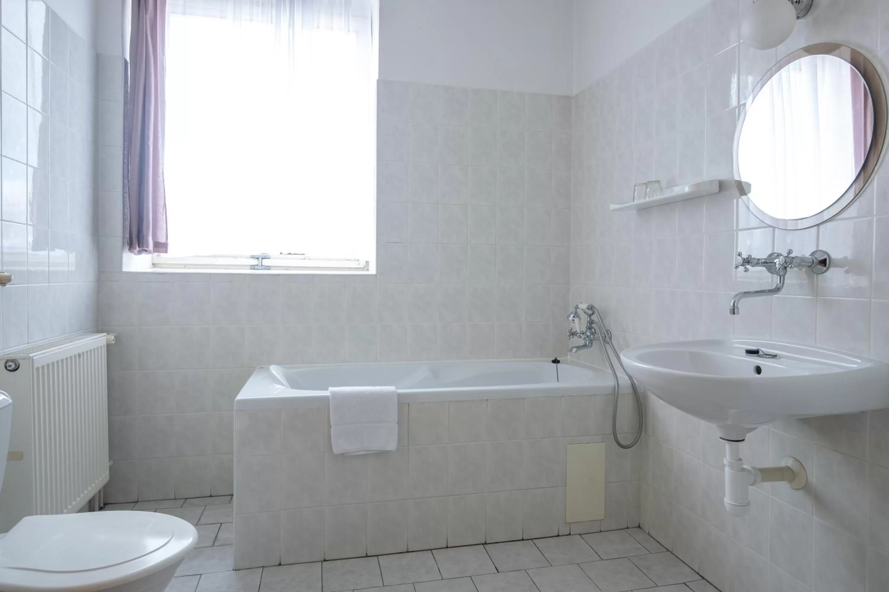 Property building, Bathroom in Hotel Slovan Plzeň