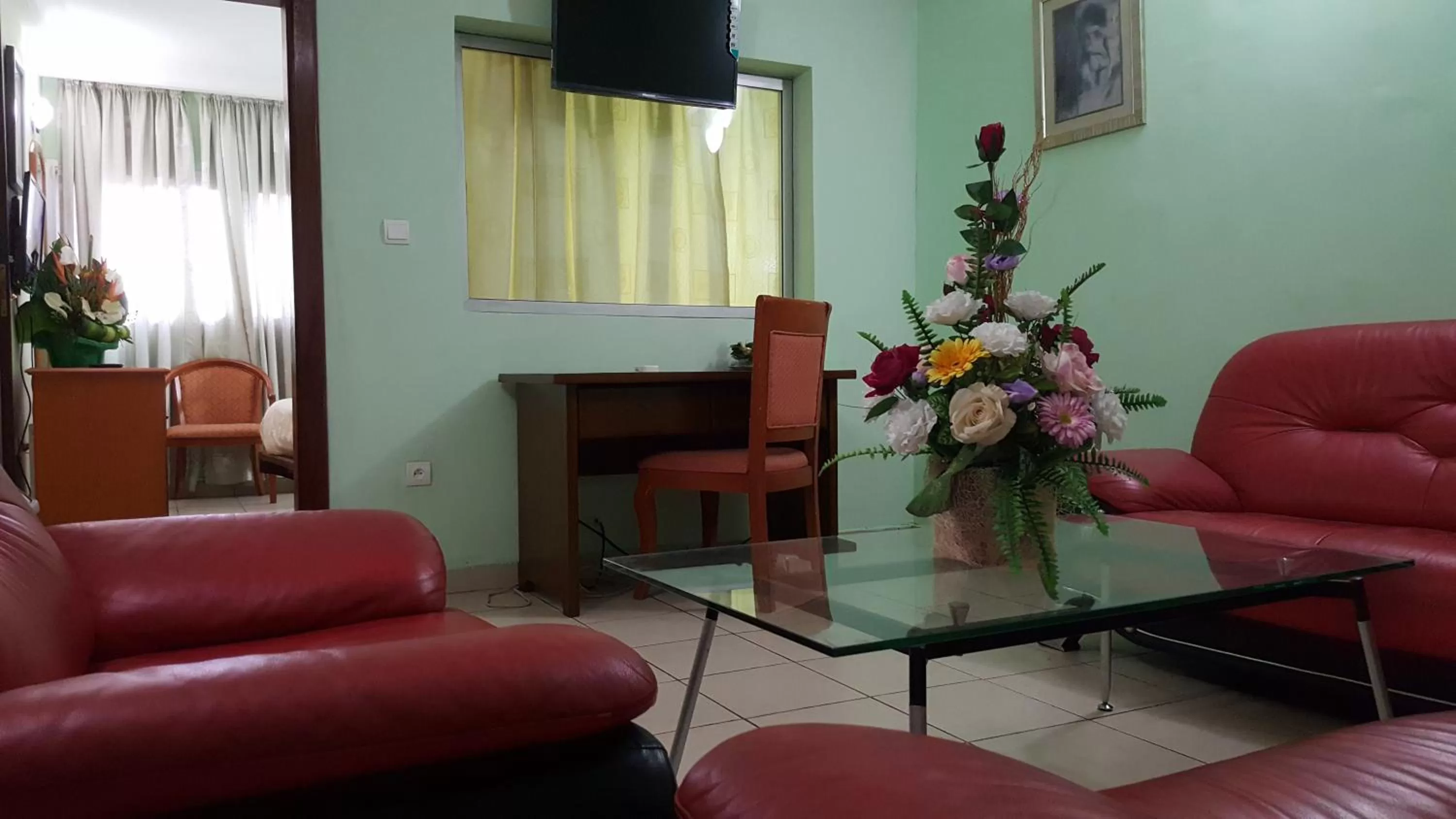Living room, Seating Area in Peninsula Hotel Douala