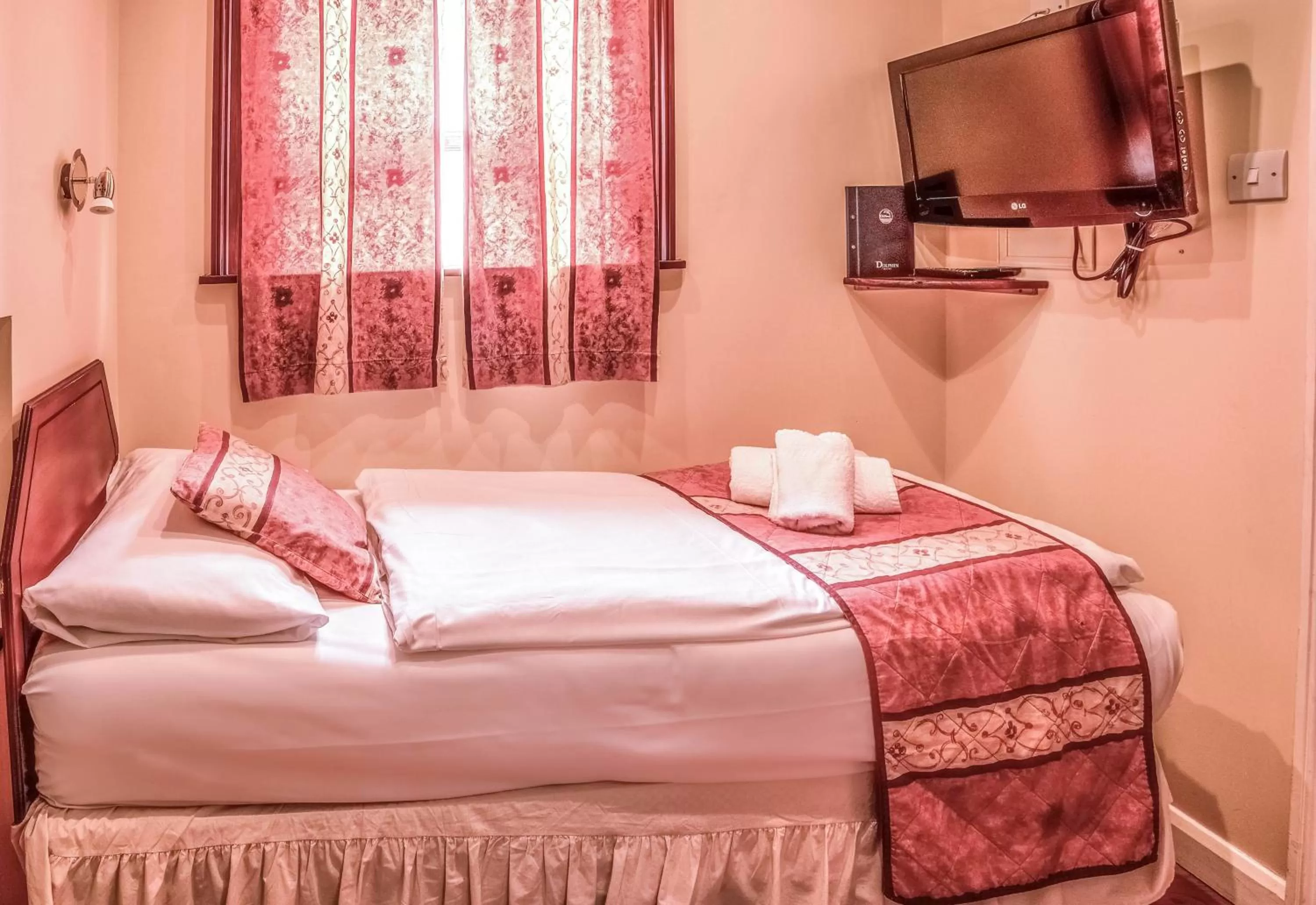 Bed in Dolphin Hotel