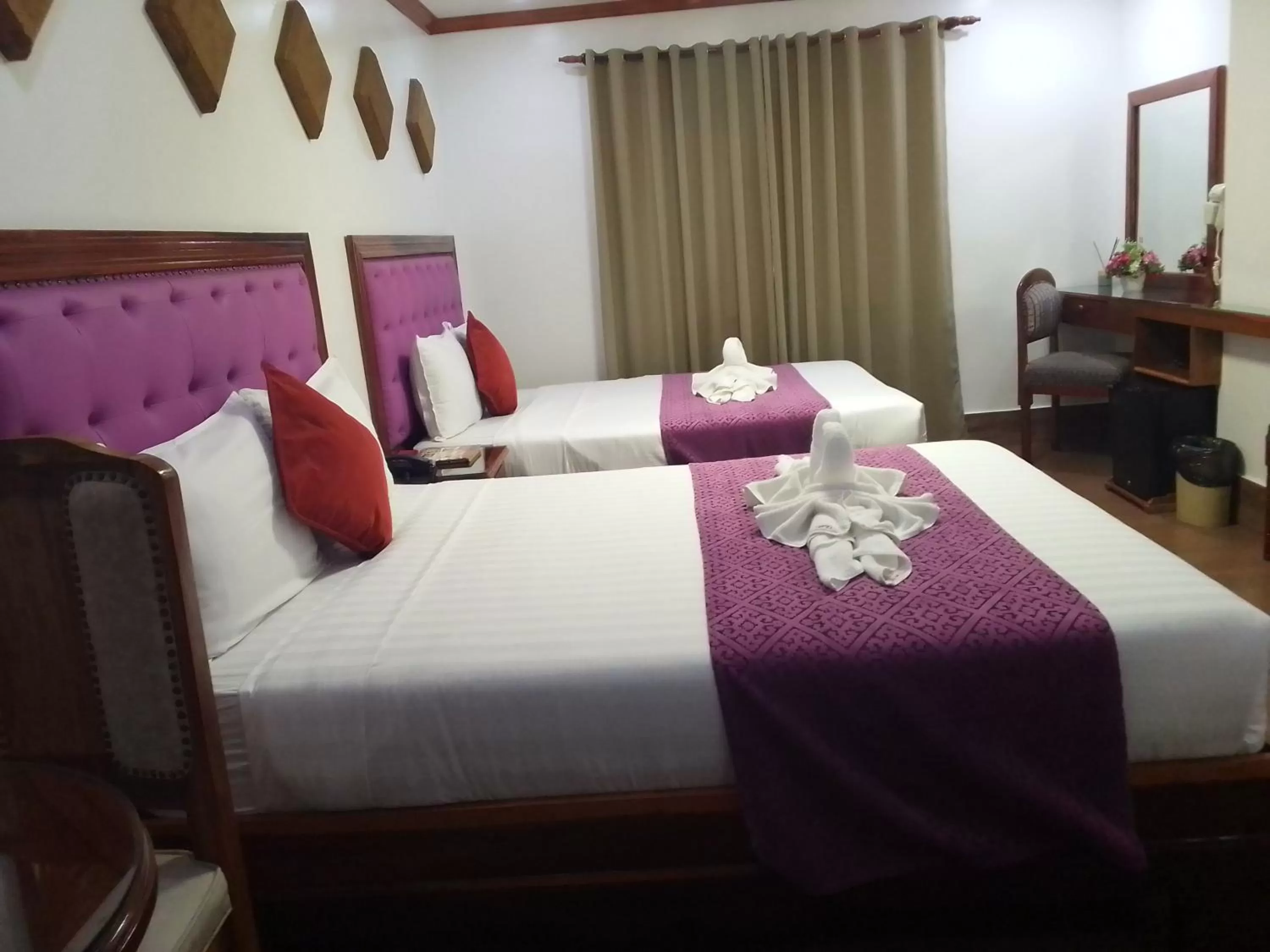 Bed in CLN Boutique Hotel