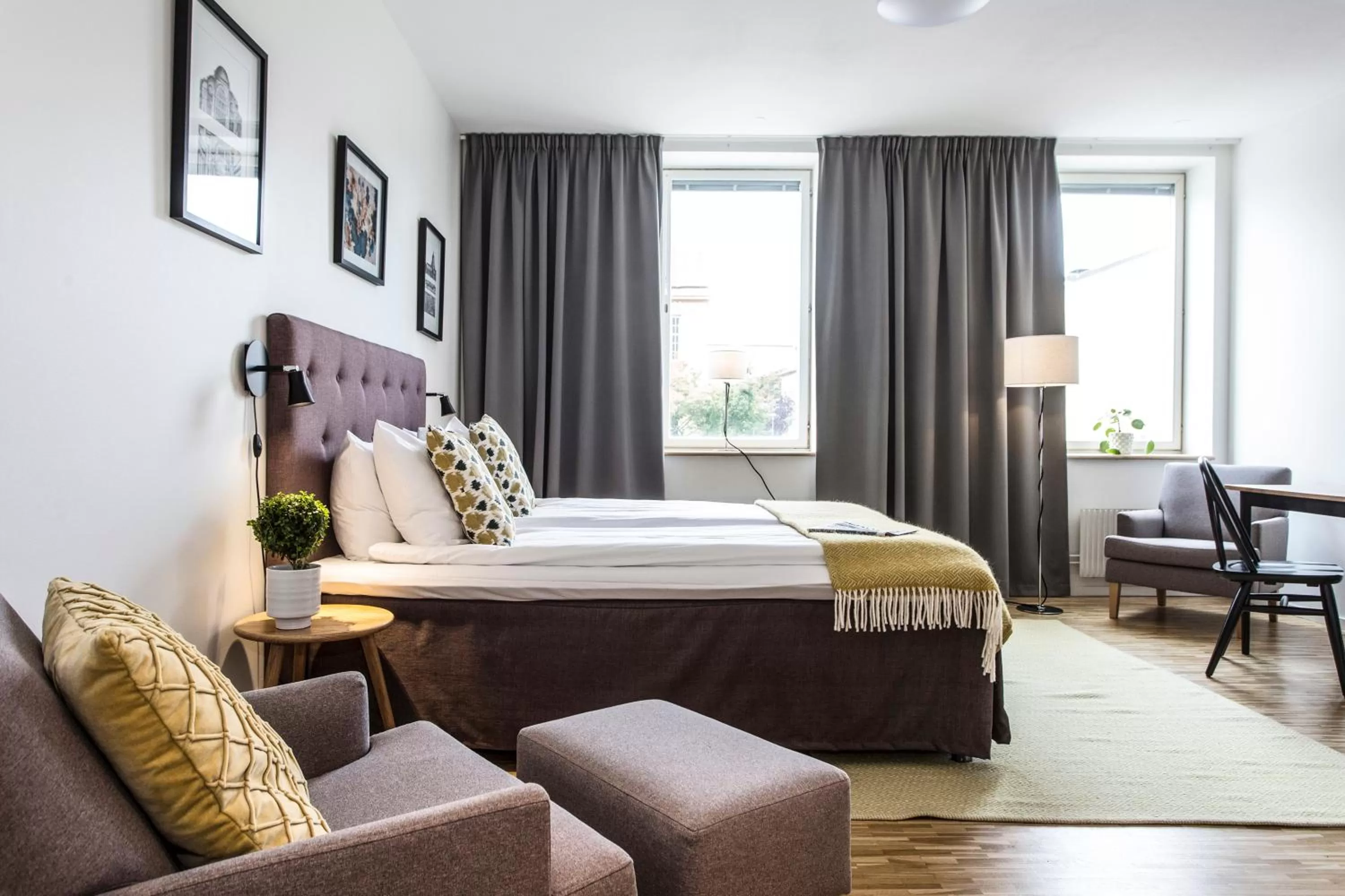 Living room, Bed in Biz Apartment Solna