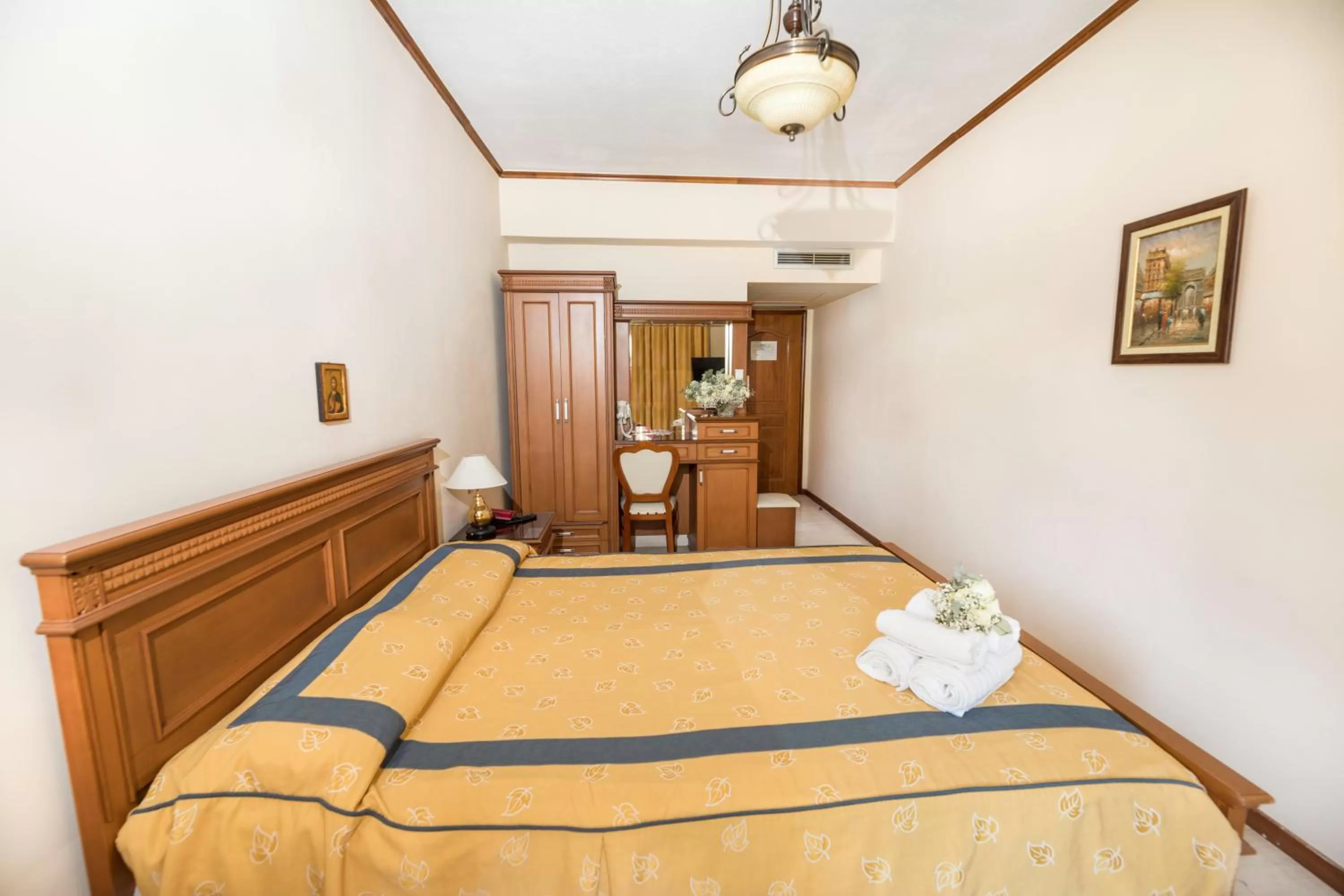 Bed in Famissi Hotel