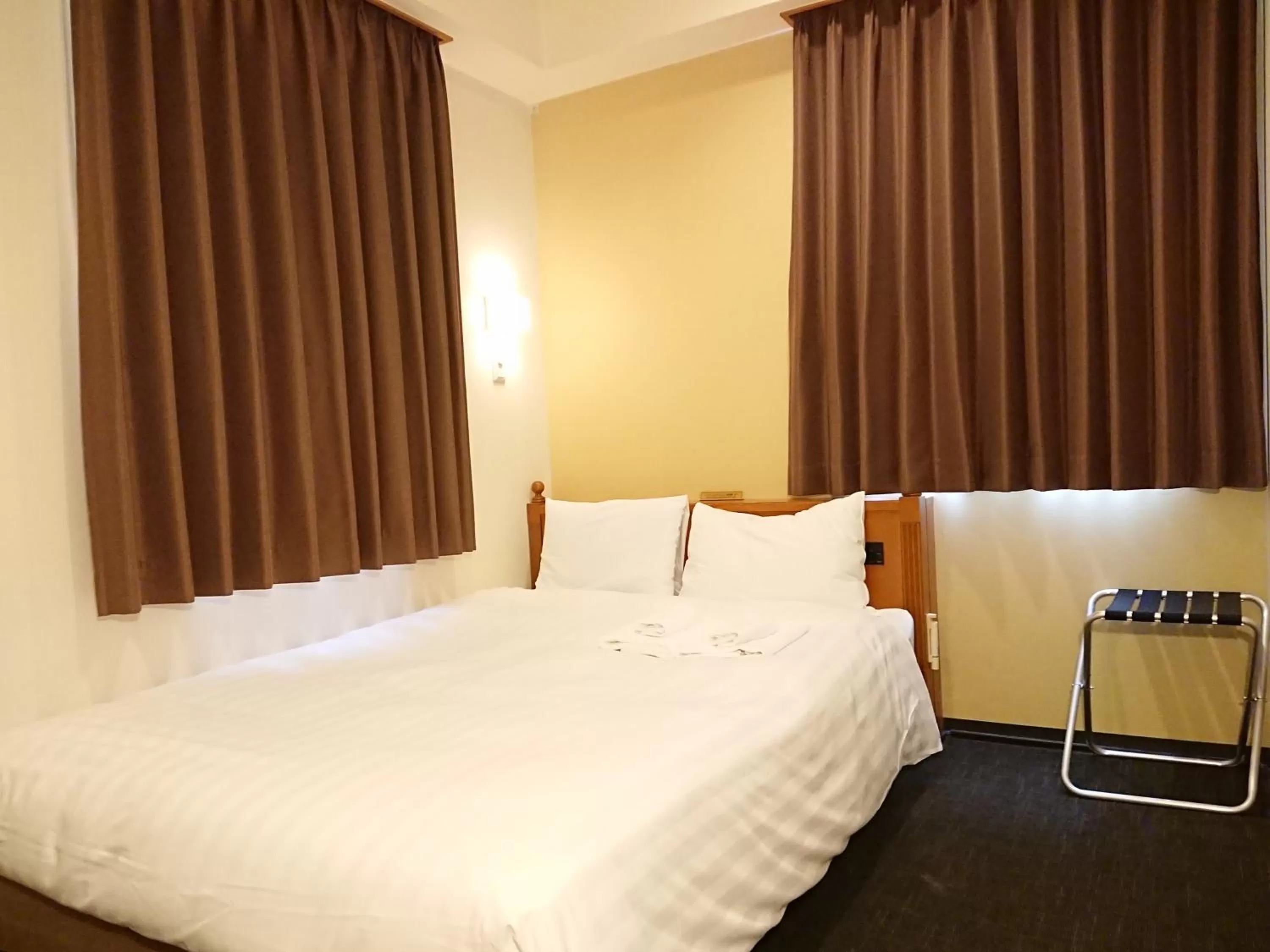 Photo of the whole room, Bed in Smile Hotel Kobe Motomachi