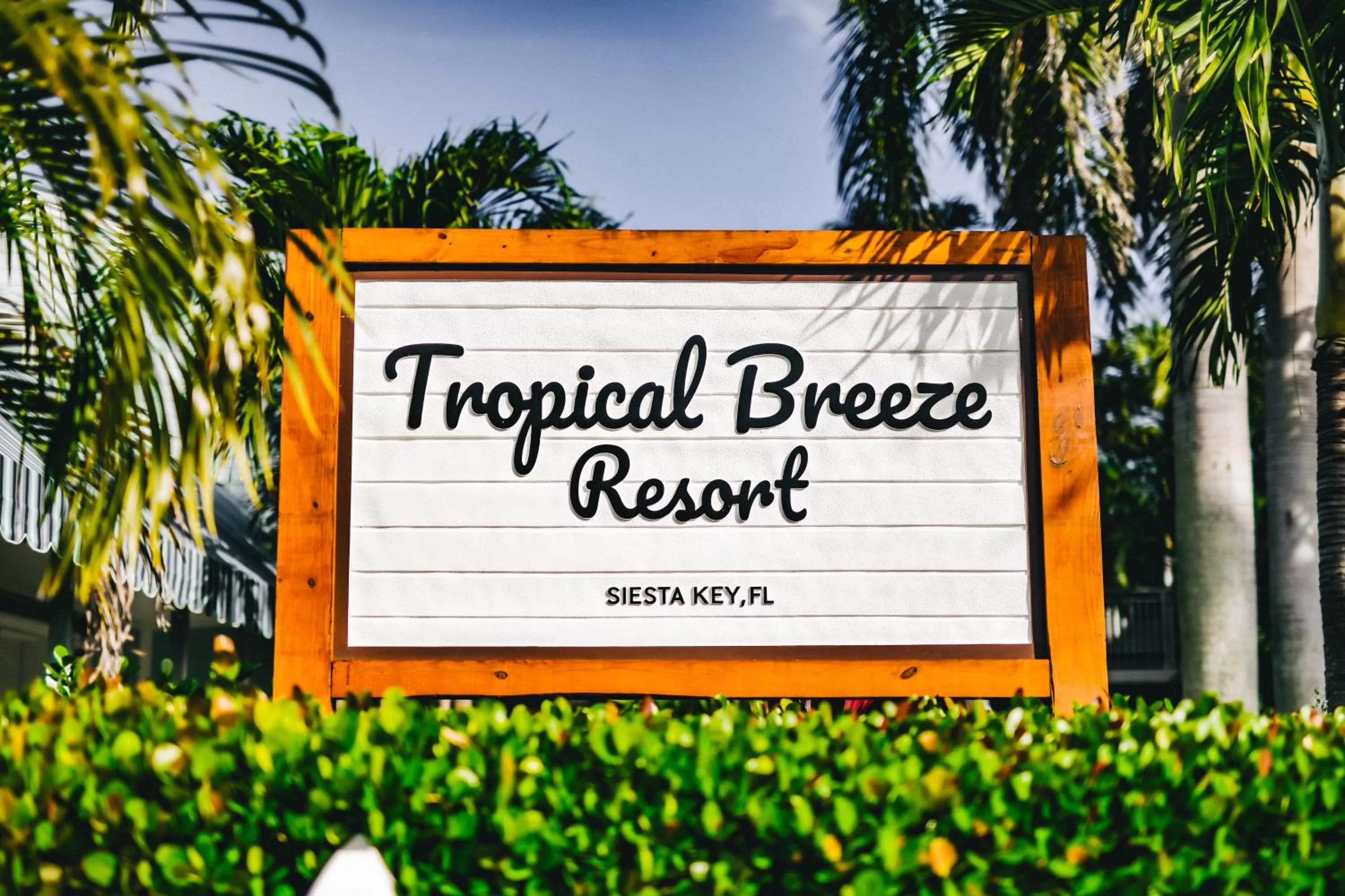 Property logo or sign in Tropical Breeze Resort