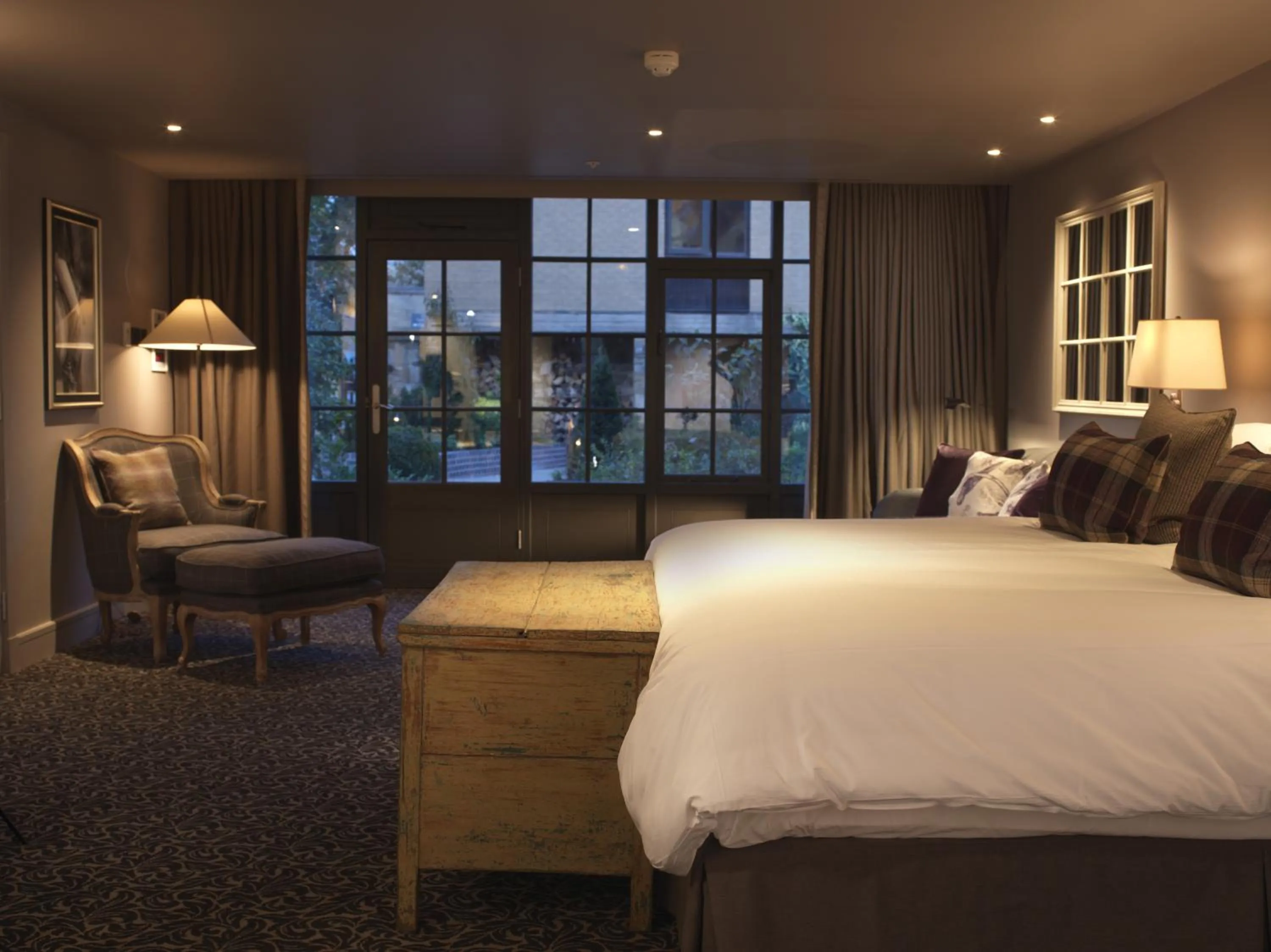 Bed in The Lygon Arms - an Iconic Luxury Hotel