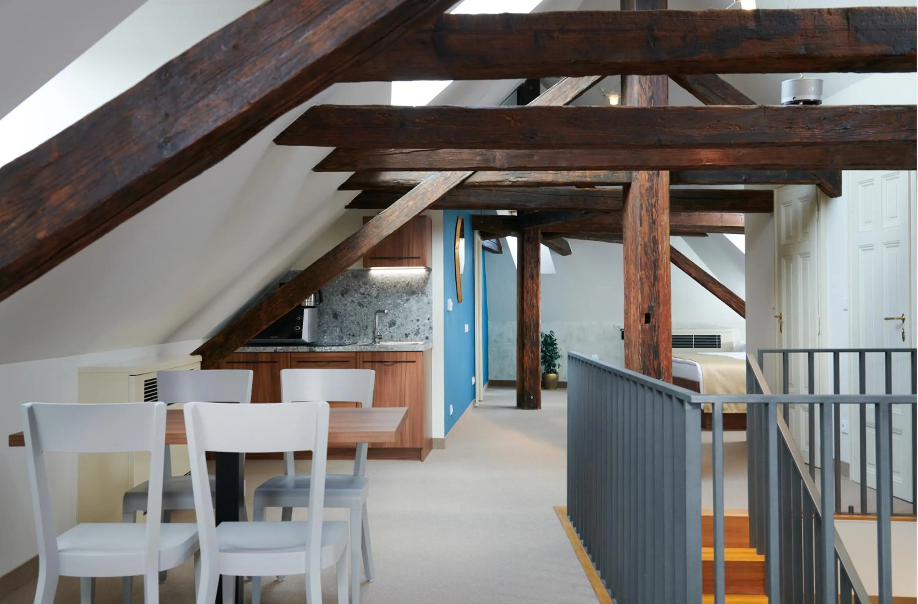 Dining area in Golden Angel Suites by Adrez