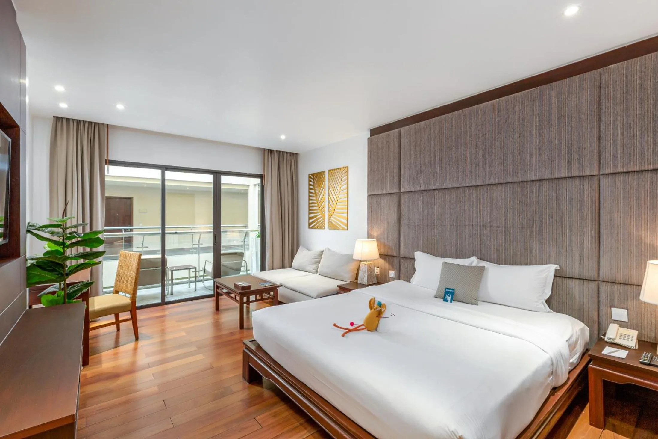 Photo of the whole room, Bed in Baan Laimai Beach Resort & Spa - SHA Extra Plus