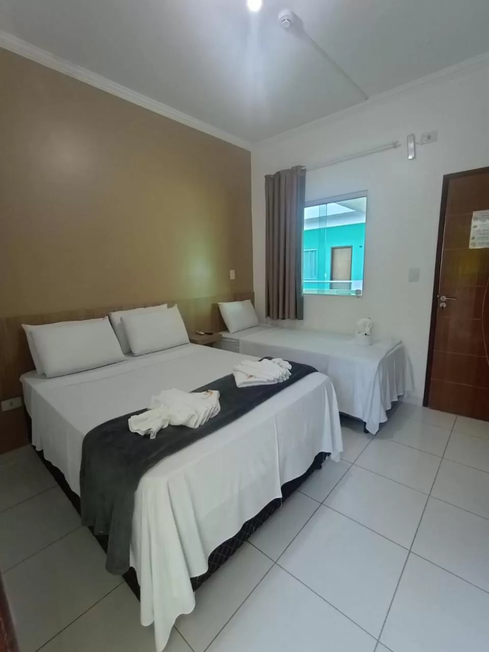 Bed in Pousada Concha Dourada