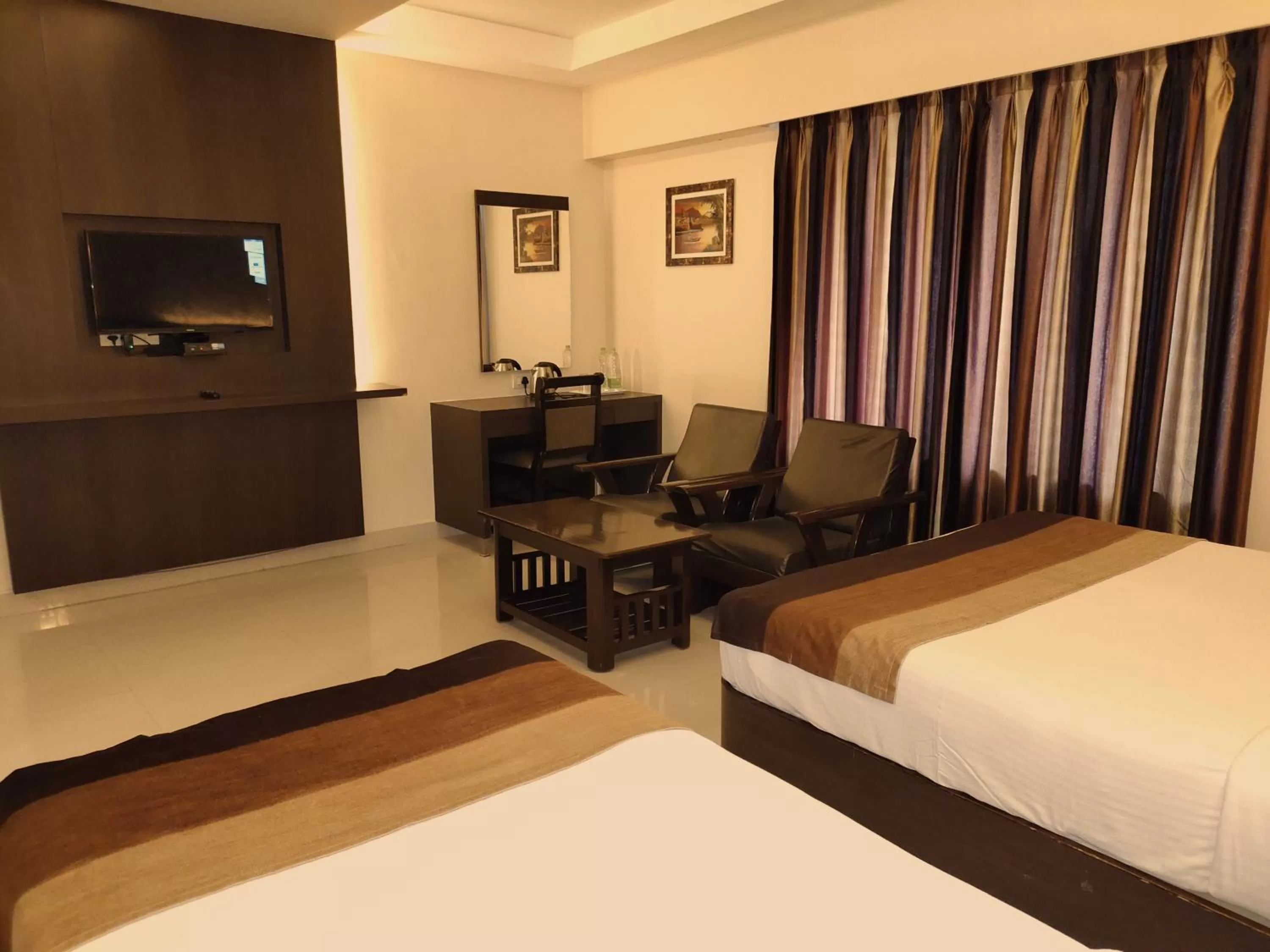 TV and multimedia, Bed in Hotel Deepam
