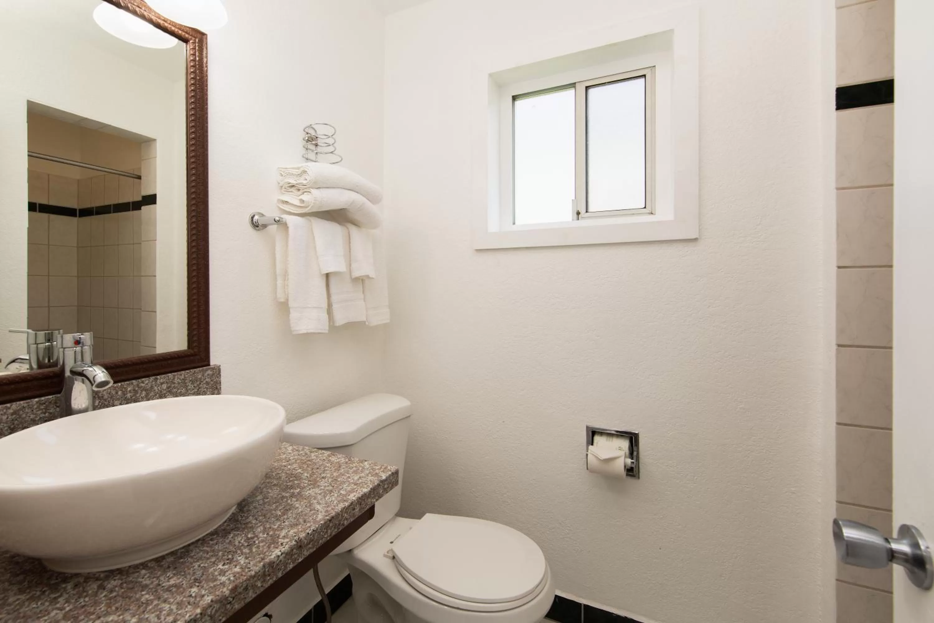 Bathroom in Travel Lodge by Wyndham Merced Yosemite