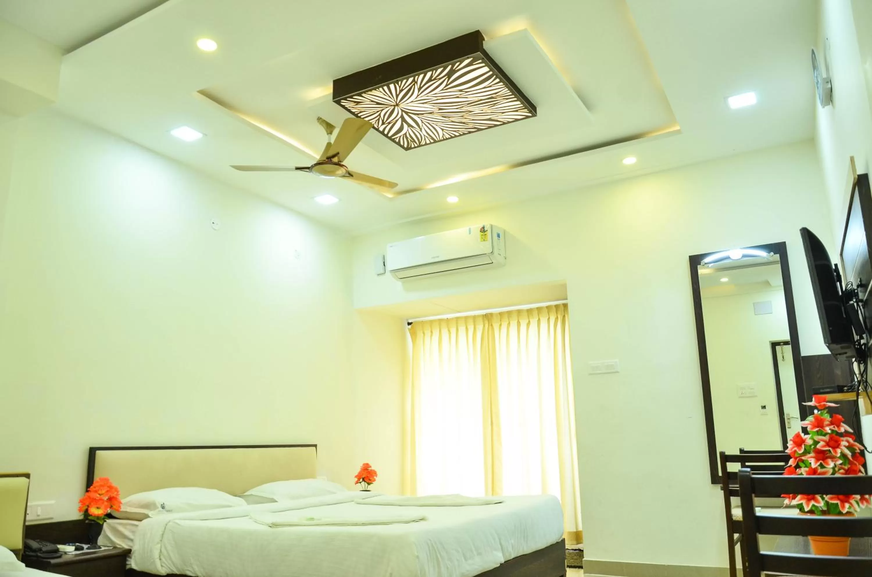 Bed in Hotel Ambai Grand