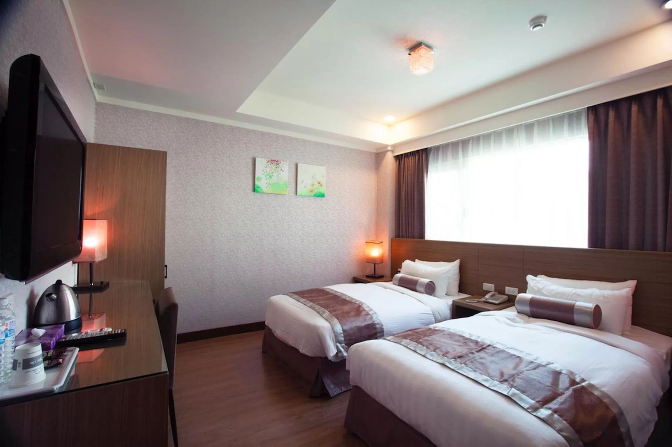 Bed in True Friend Hotel