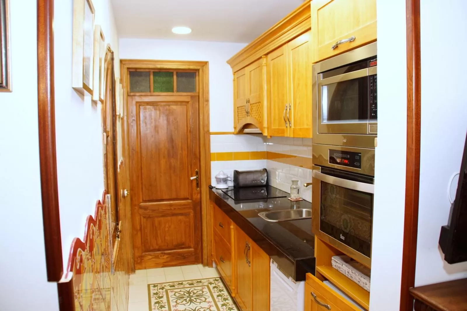 Kitchen or kitchenette in Sitges Royal Rooms