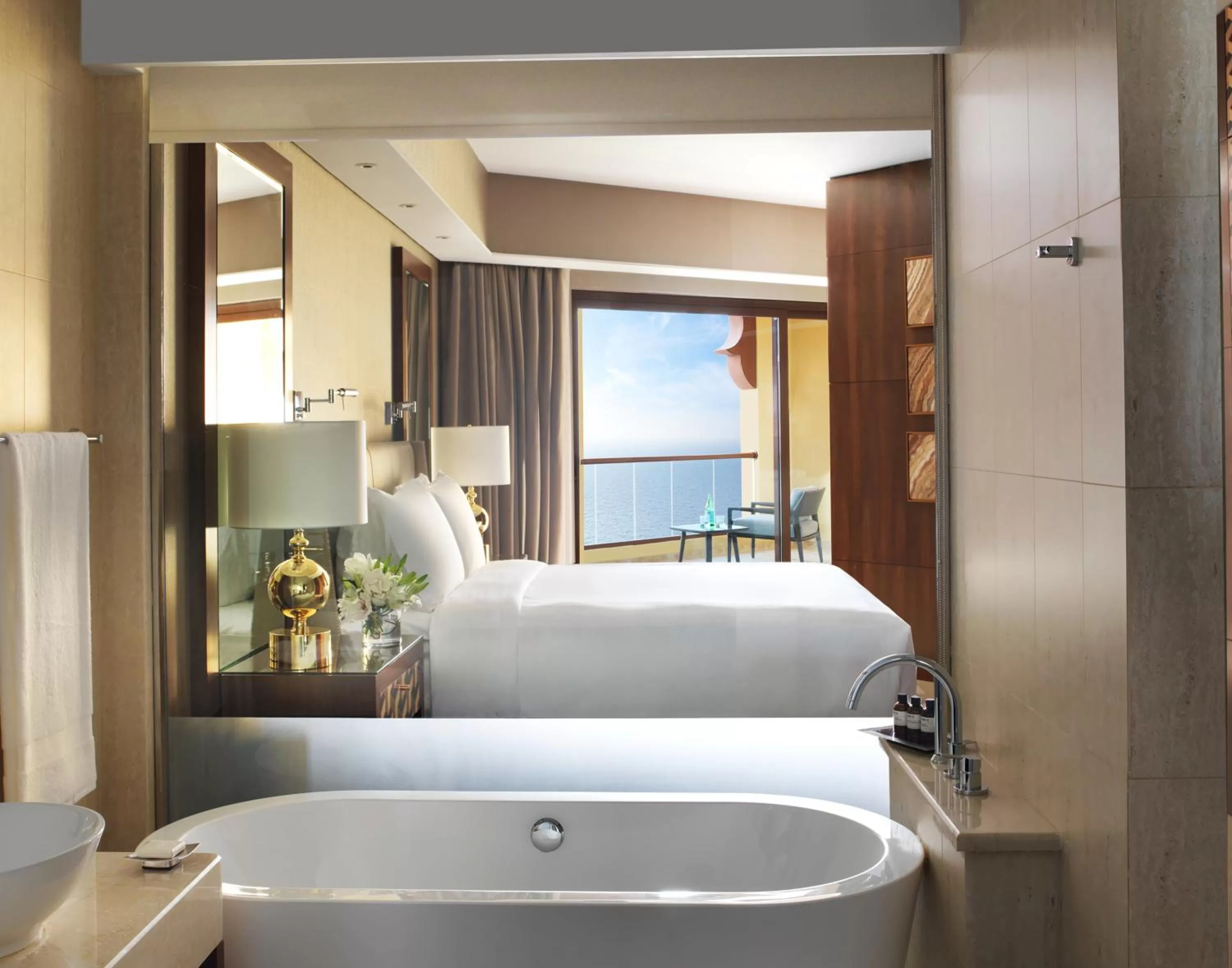 Bathroom, Bed in Fairmont Ajman
