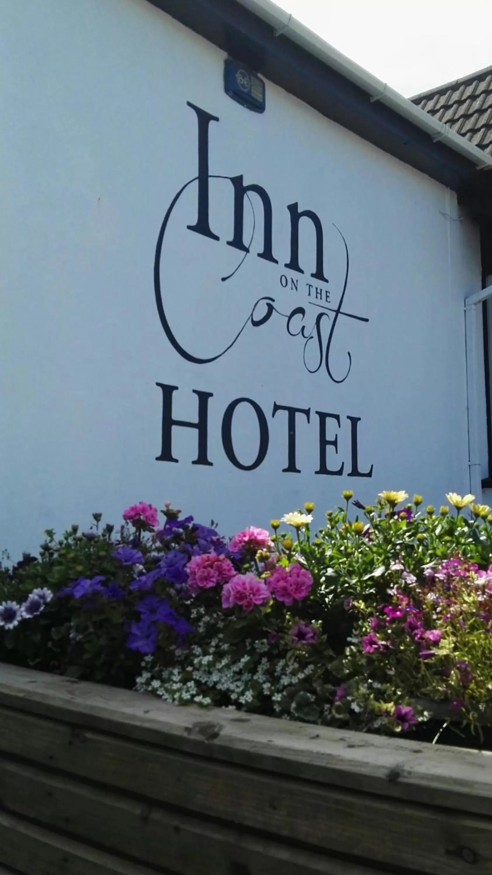 Property logo or sign in Inn On The Coast