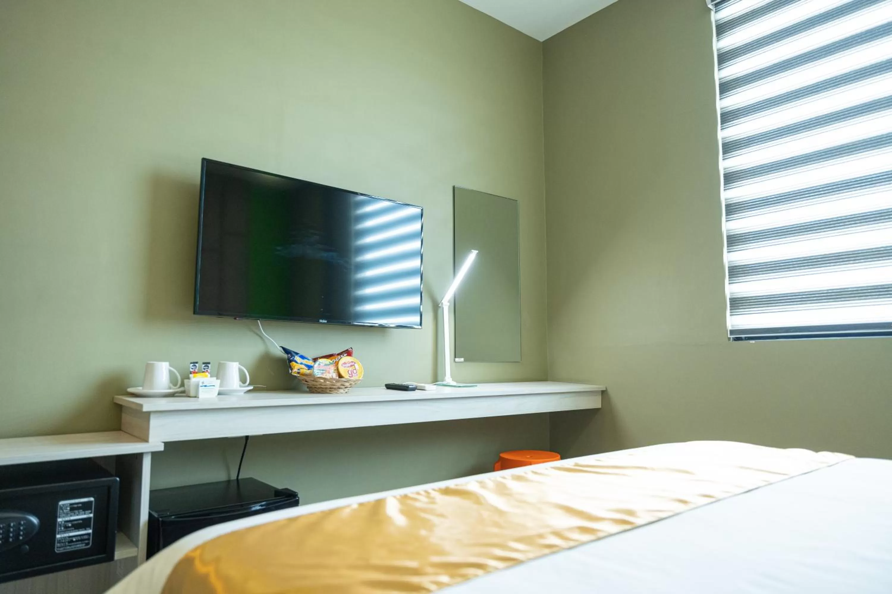 TV and multimedia, Bed in Felicity Island Hotel