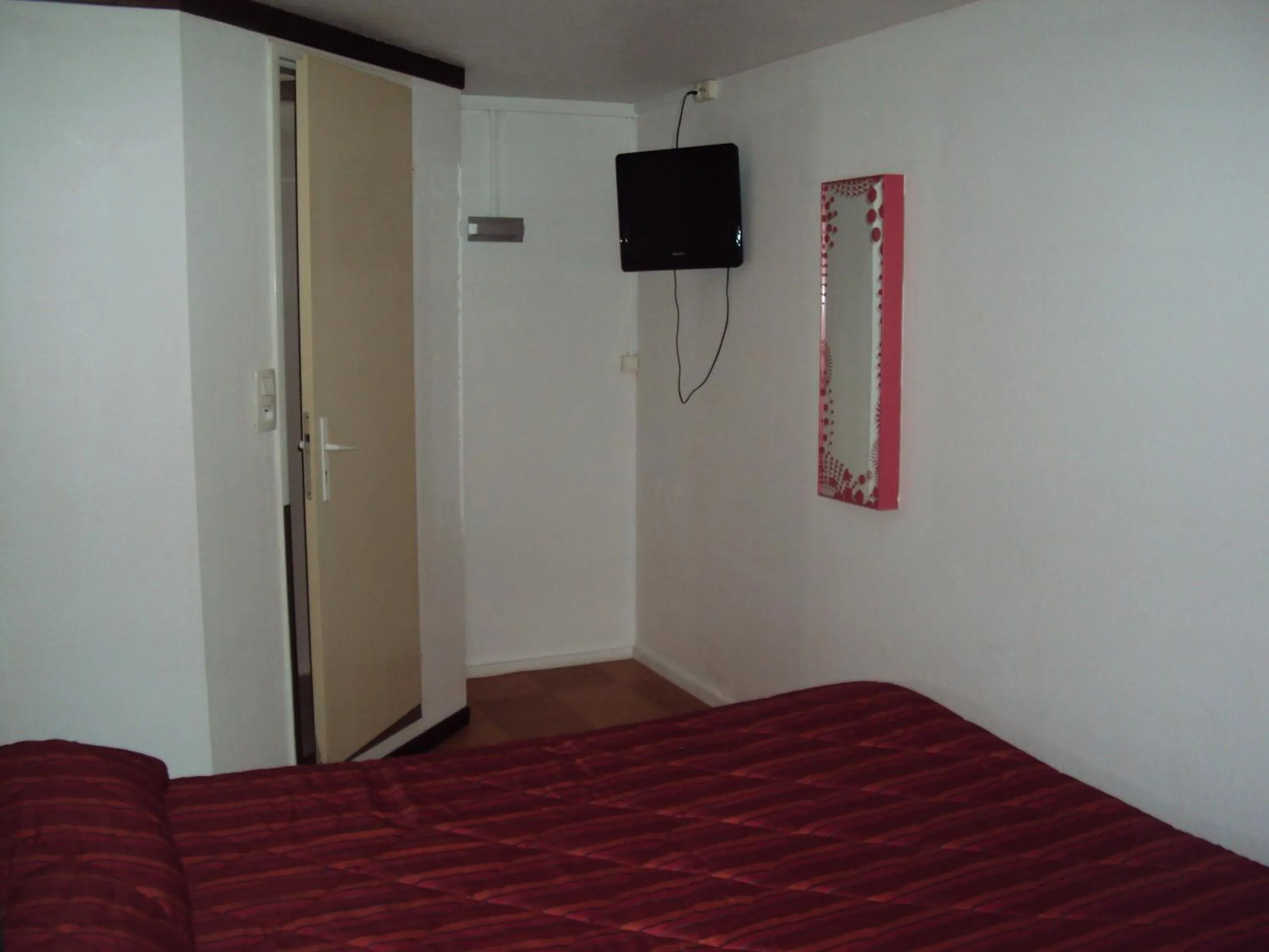 Photo of the whole room, Bed in Premiere Classe Epinal