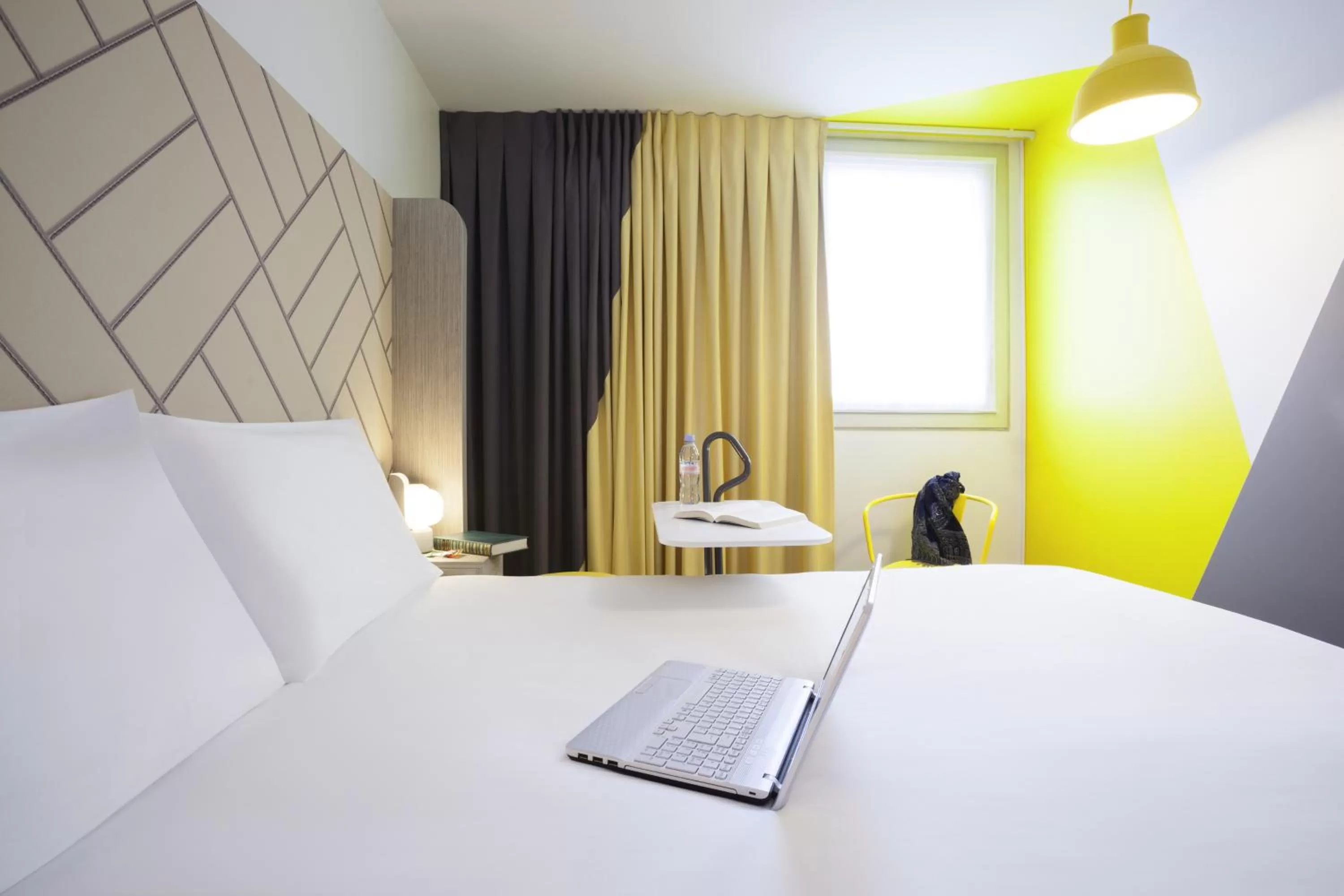 Bed in Ibis Styles Paris Massena Olympiades